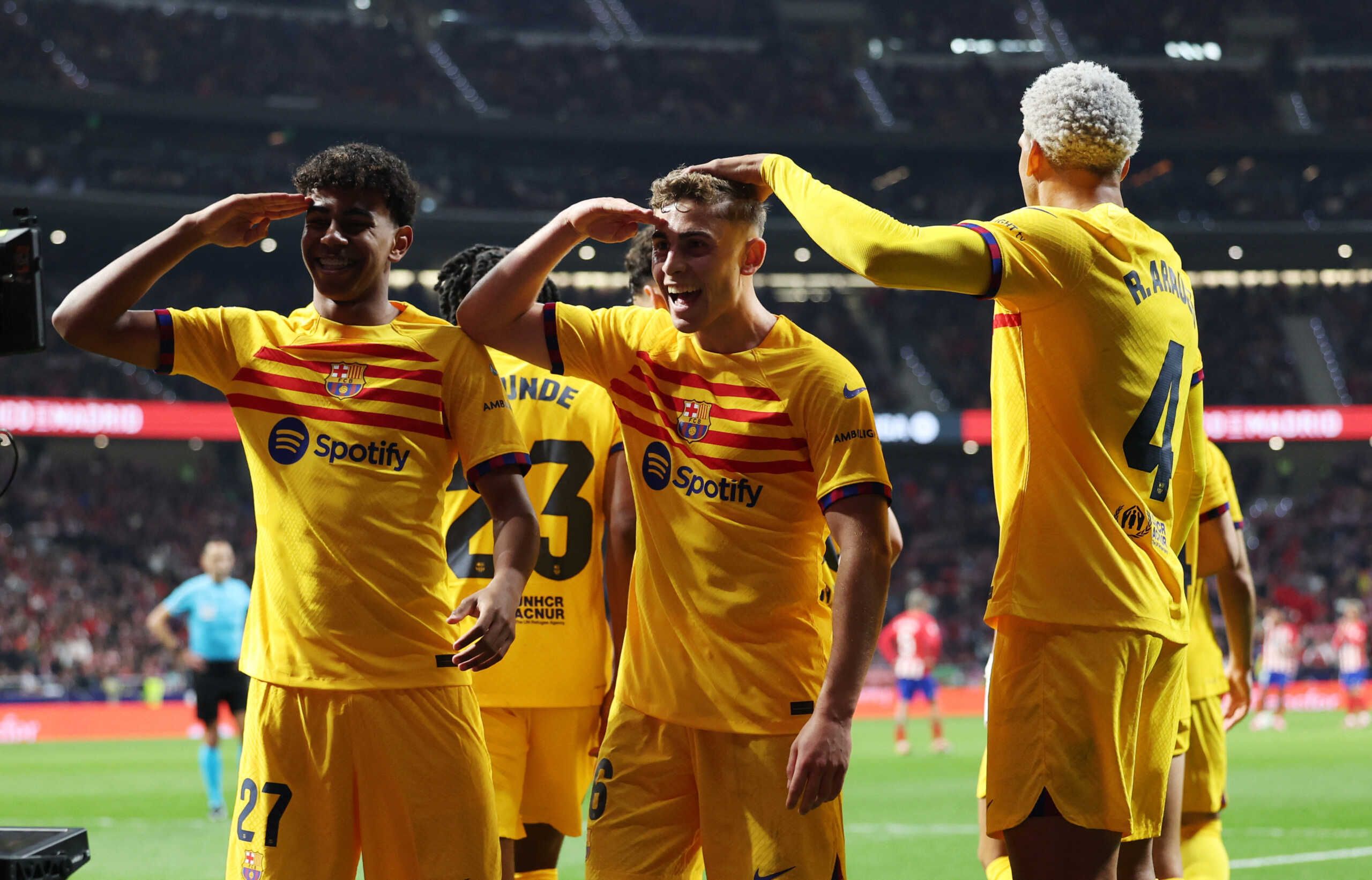 Soccer Football - LaLiga - Atletico Madrid v FC Barcelona - Metropolitano, Madrid, Spain - March 17, 2024 FC Barcelona's Fermin Lopez celebrates scoring their third goal with Lamine Yamal and Ronald Araujo REUTERS