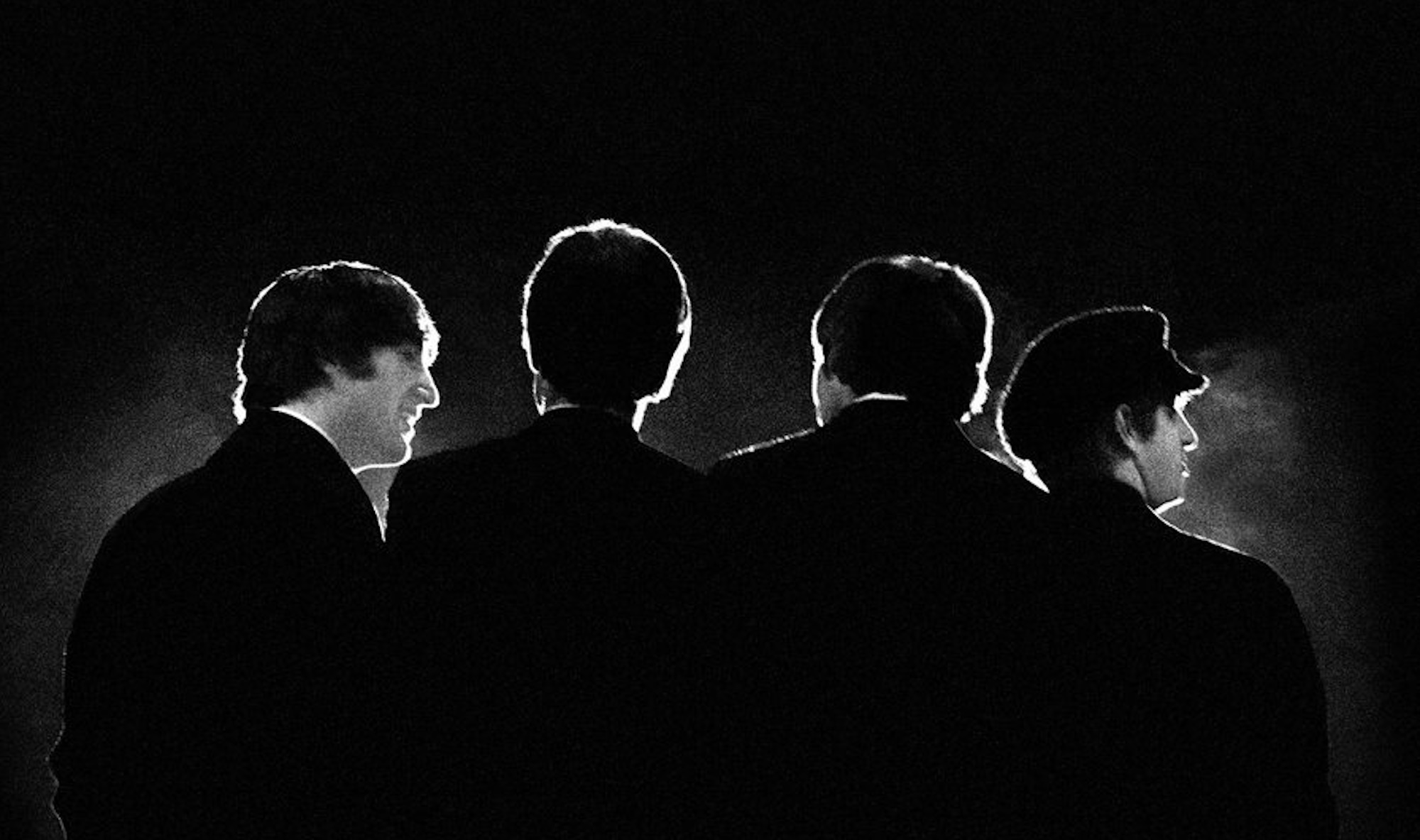 epa02773780 A handout image provided by Christie's on 10 June 2011 shows the Beatles giving their back to the camera in 1964. This picture, taken by the photographer Mike Mitchell when he was 18 years old, is part of a collection comprising 50 lots of unpublished and never-before-seen photographs of the Beatles' first visits to the US in 1964. The works were unveiled on 10 June 2011 at Christie's auction house in London, Britain and will go under the hammer at its New York branch on 20 July. The complete collection is expected to reach a price of 69,000 Euros.  EPA