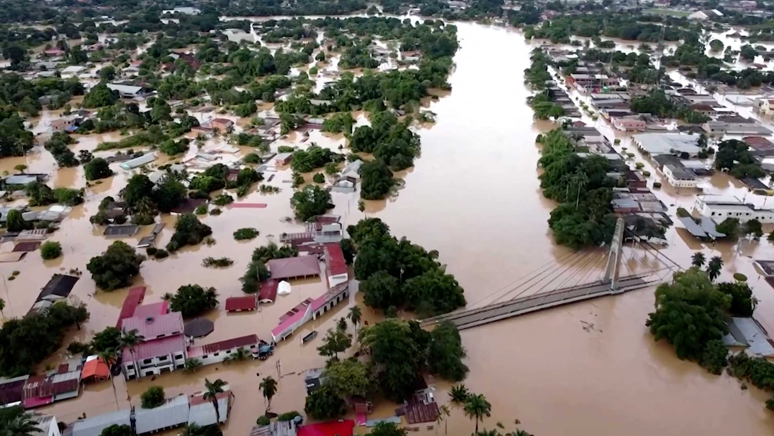 A drone view shows the flooded city near border with Brazil, in Cobija, Bolivia, February 28, 2024, in this screengrab taken from a video. Cochabamba Municipality
