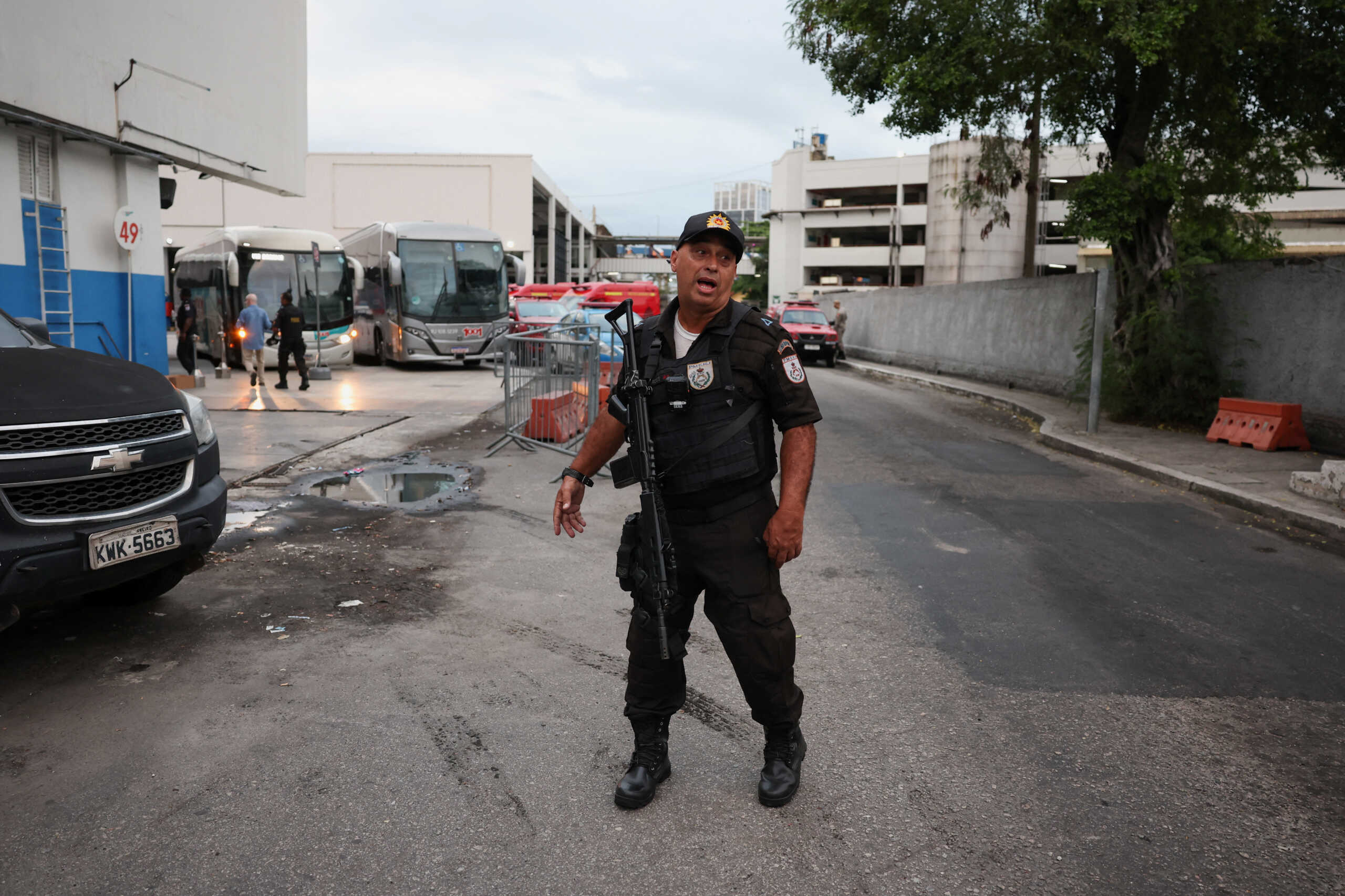 A police officer walks at the bus terminal station after a man hijacked a bus with passengers, in Rio de Janeiro, Brazil, March 12, 2024. REUTERS