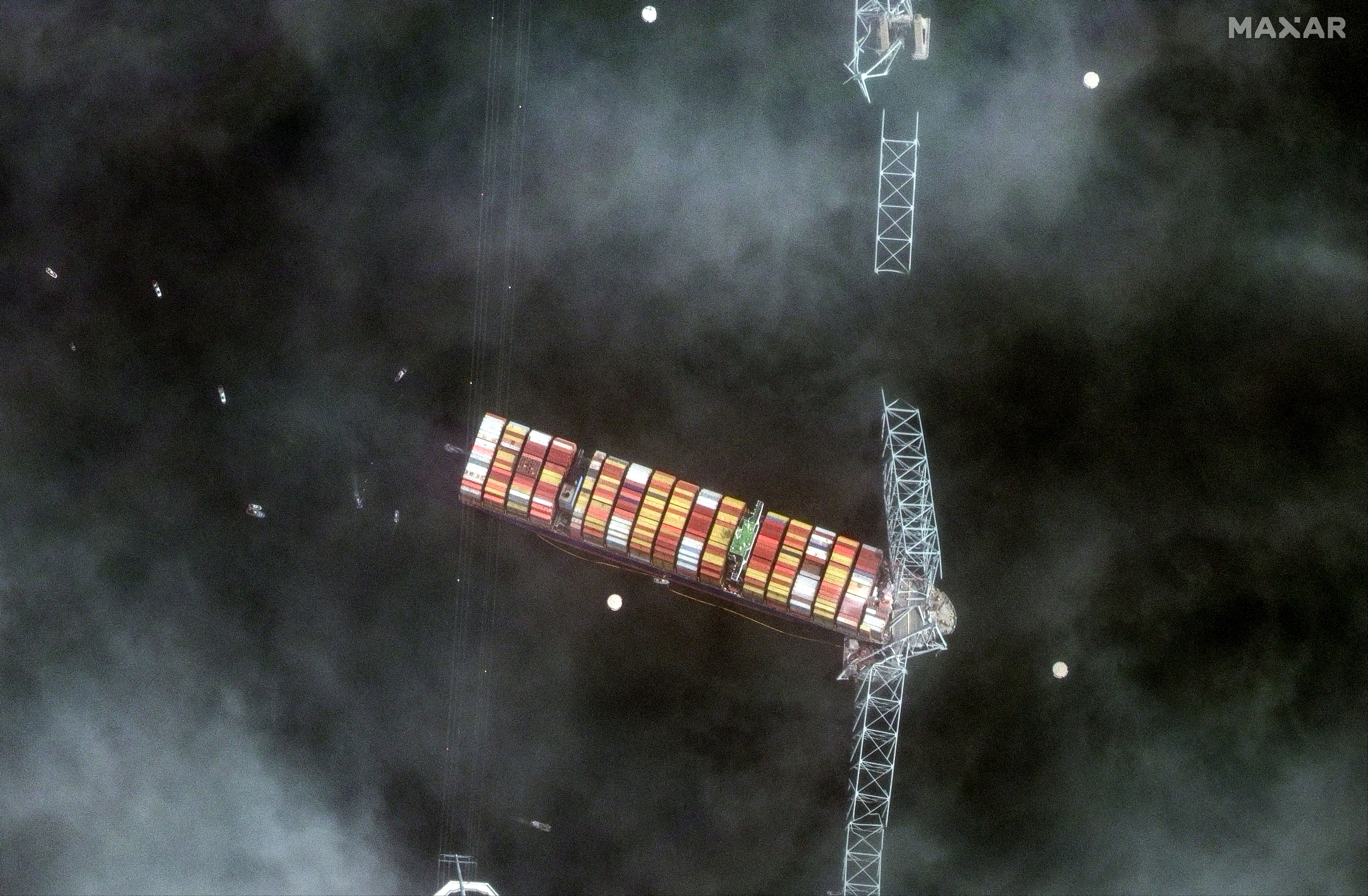 A satellite image shows a closer view of the Dali container ship and a collpased Francis Scott Key Bridge in Baltimore, Maryland, U.S., March 26, 2024. Maxar Technologies