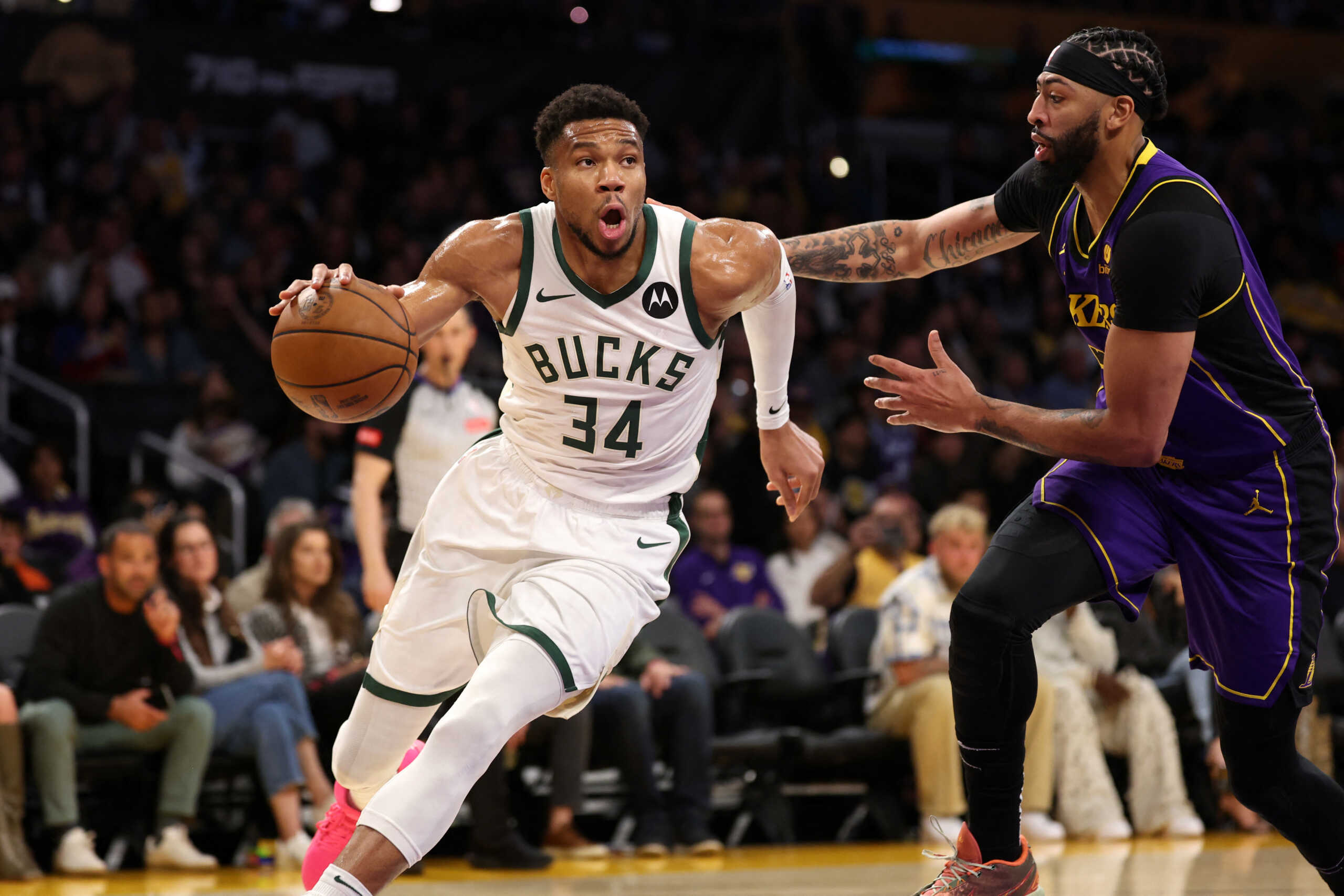 Mar 8, 2024; Los Angeles, California, USA;  Milwaukee Bucks forward Giannis Antetokounmpo (34) drives to the basket against Los Angeles Lakers forward Anthony Davis (3) during the first quarter at Crypto.com Arena. Mandatory Credit: Kiyoshi Mio-USA TODAY Sports