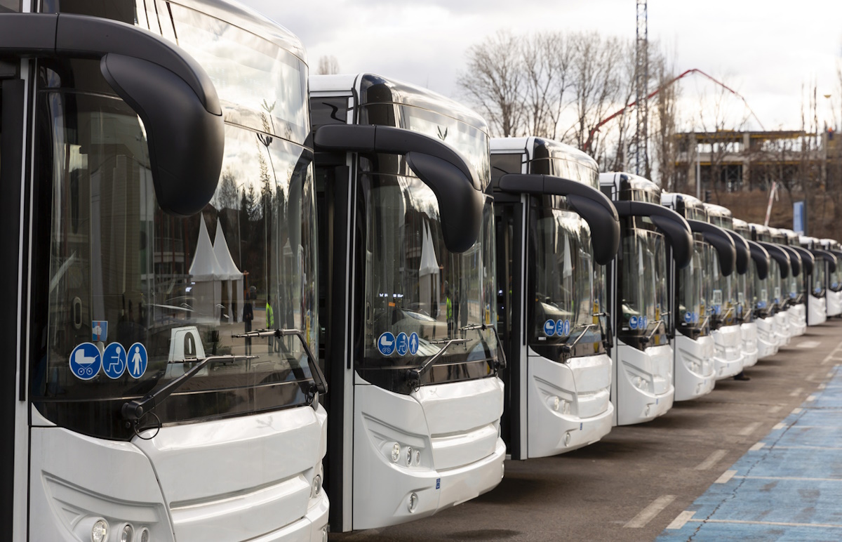 New modern busses on LPG. International Symbol of Access - Wheelchair Symbol (handicapped, physically challenged and disabled), Baby Stroller Symbol and Elderly (Old) People Symbol on the windshield.
