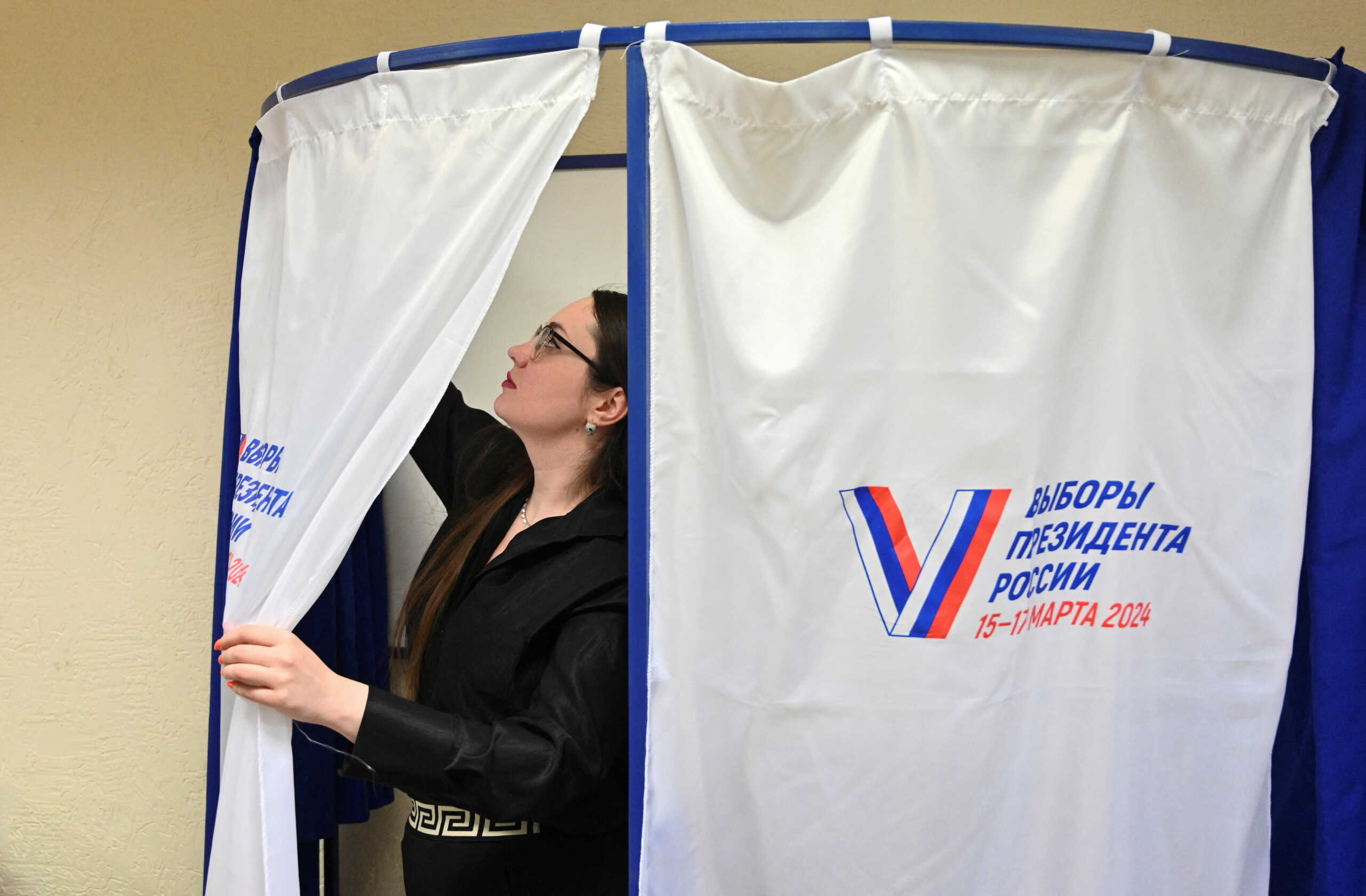 A member of a local electoral commission works at a polling station during preparations for the presidential election, in Rostov-on-Don, Russia, March 14, 2024. REUTERS