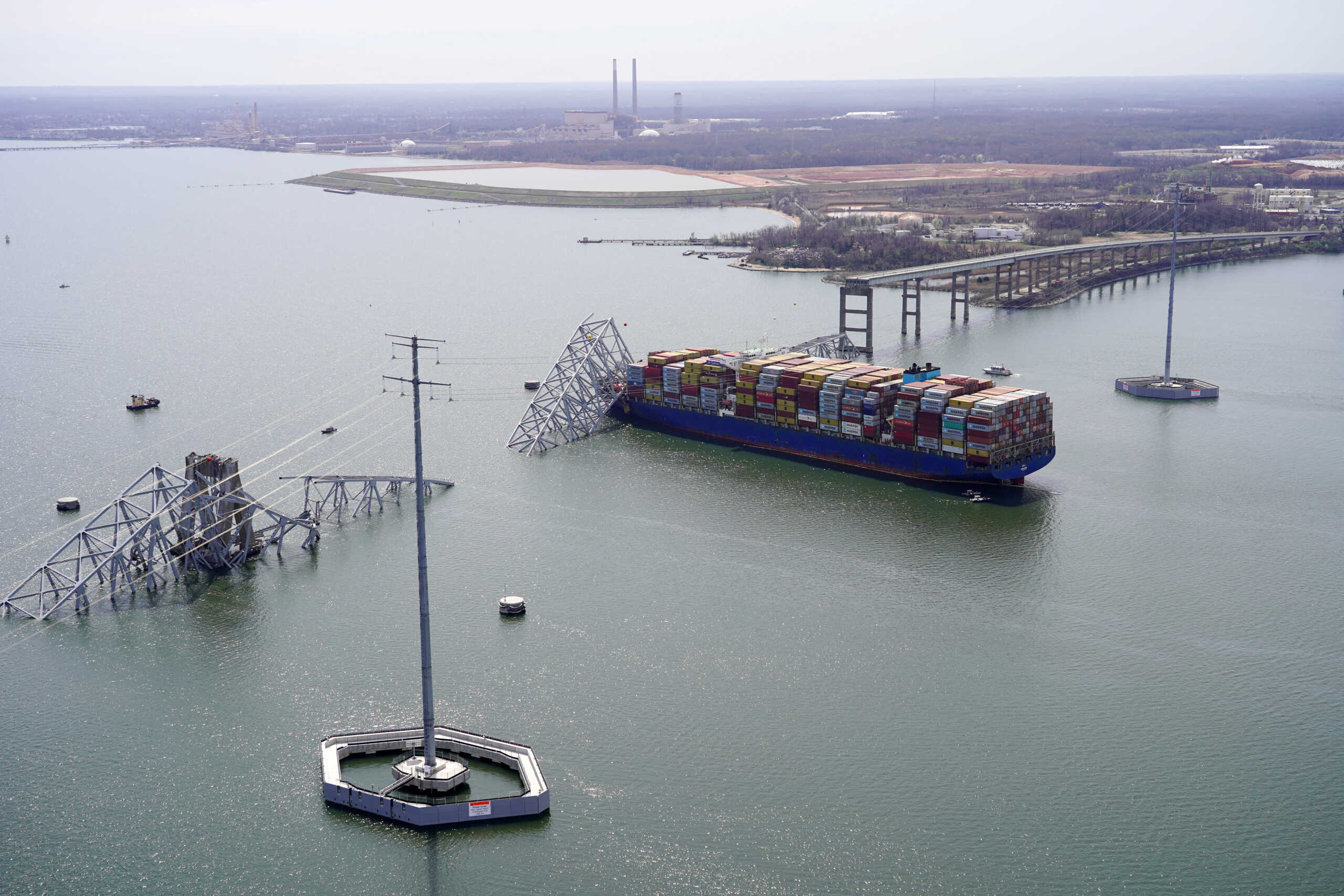 Aerial view of the Dali cargo vessel which crashed into the Francis Scott Key Bridge, causing it to collapse in Baltimore, Maryland, U.S., March 26, 2024. Maryland National Guard