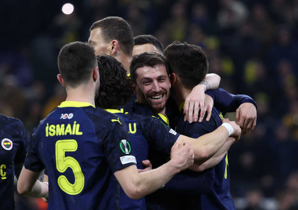 Soccer Football - Europa Conference League - Round of 16 - First Leg - Union Saint-Gilloise v Fenerbahce - Lotto Park, Anderlecht, Belgium - March 7, 2024 Fenerbahce's Dusan Tadic celebrates scoring their third goal with teammates REUTERS