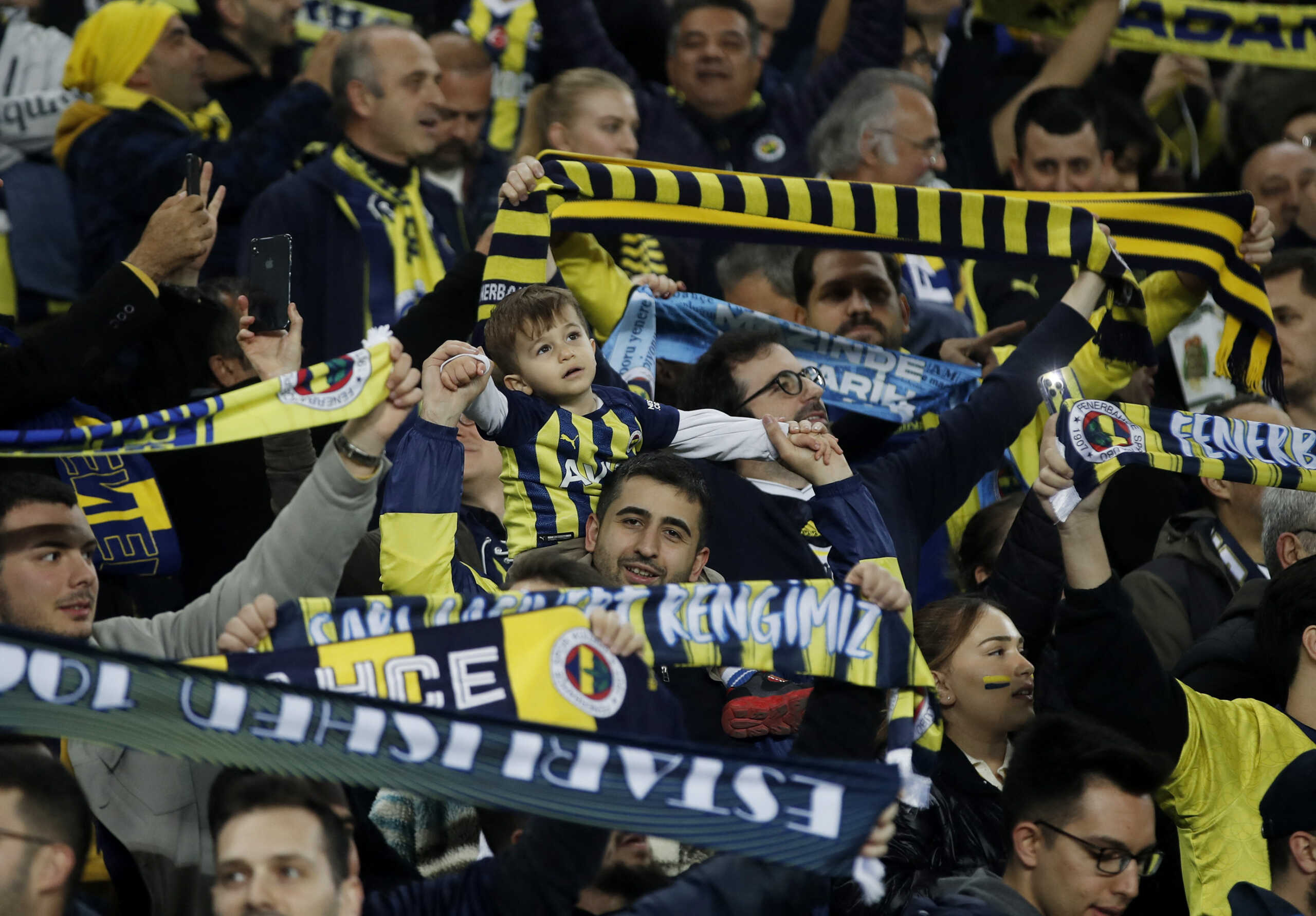 Soccer Football - Europa Conference League - Round of 16 - Second Leg - Fenerbahce v Union Saint-Gilloise - Sukru Saracoglu Stadium, Istanbul, Turkey - March 14, 2024 A young Fenerbahce fan in the stands before the match REUTERS