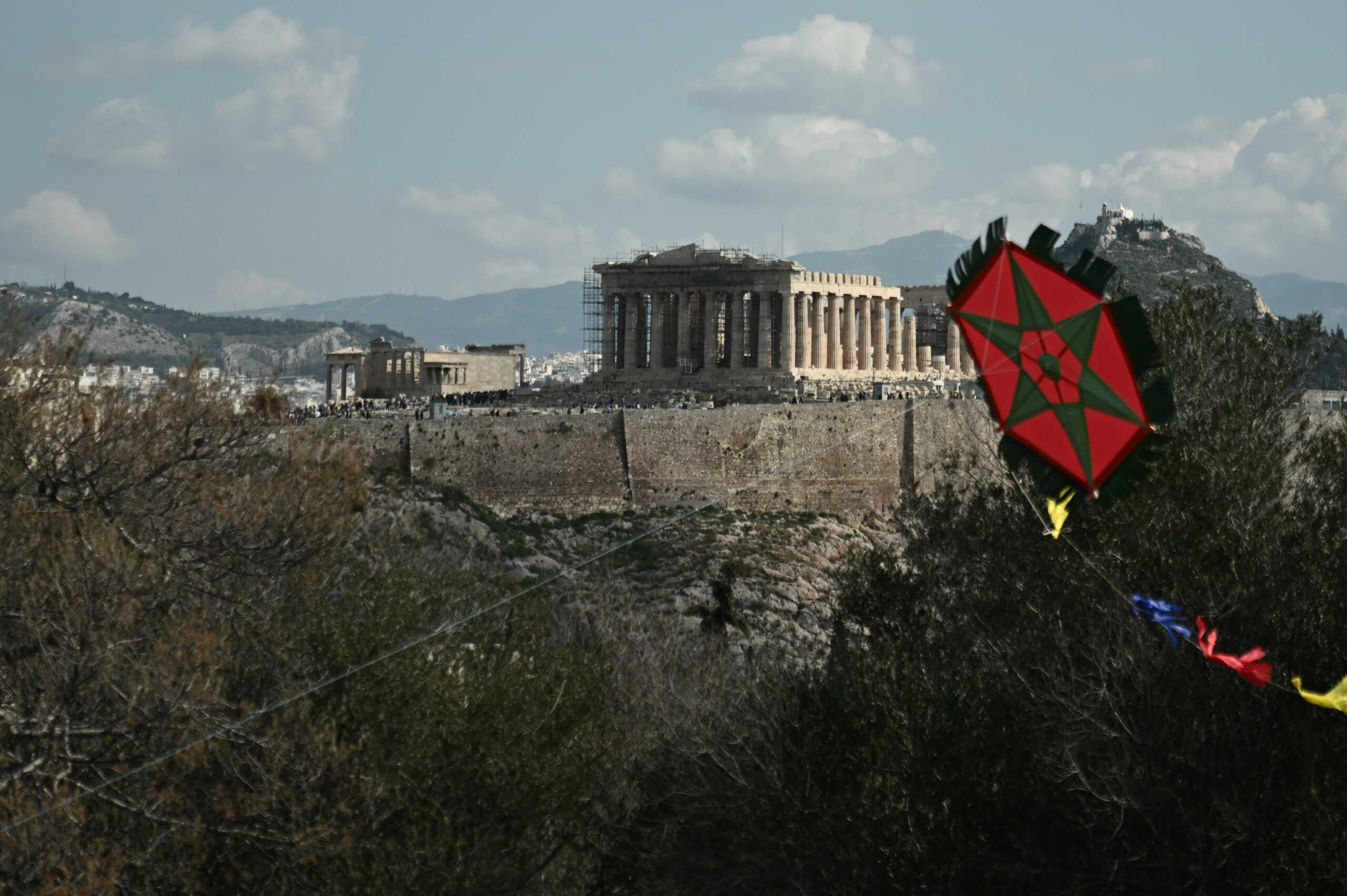 Athenians flying kites on Mount Philopappos
