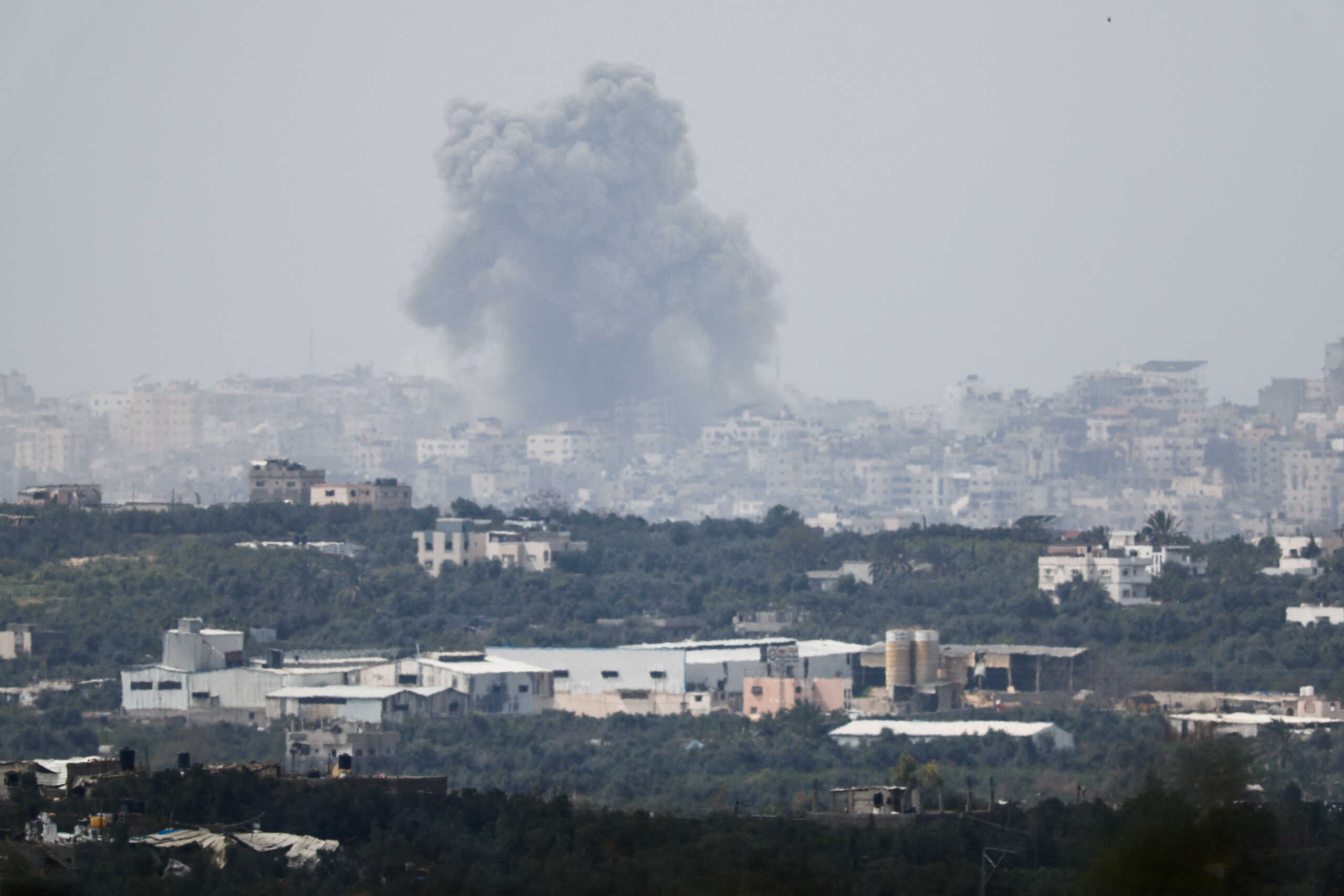 Smoke rises after an explosion in Gaza, amid the ongoing conflict between Israel and the Palestinian Islamist group Hamas, as seen from southern Israel, March 18, 2024. REUTERS