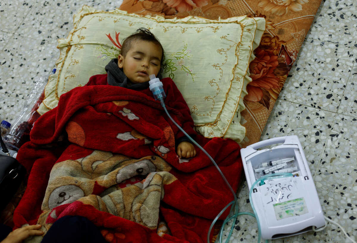 A Palestinian boy receives treatment at Al-Awda healthcare centre, amid the ongoing conflict between Israel and Hamas, in Rafah, in the southern Gaza Strip March 12, 2024. REUTERS