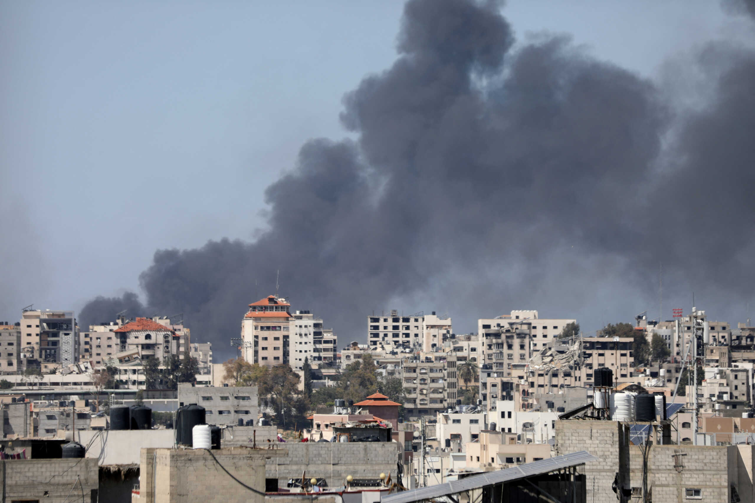 Smoke rises during an Israeli raid at Al-Shifa hospital and the area around it, amid the ongoing conflict between Israel and the Palestinian Islamist group Hamas, in Gaza City, March 20, 2024. REUTERS