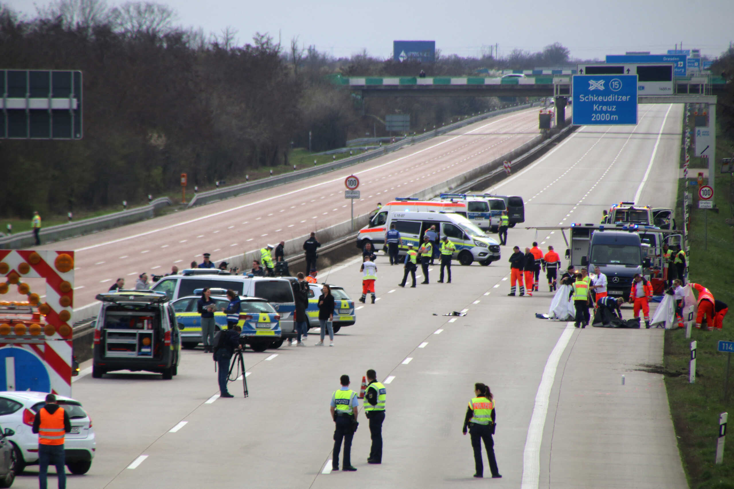 Emergency staff work at the scene after several people were killed and more injured in a coach crash on the A9 motorway off Schkeuditz, near the eastern German city of Leipzig, Germany, March 27, 2024.    REUTERS