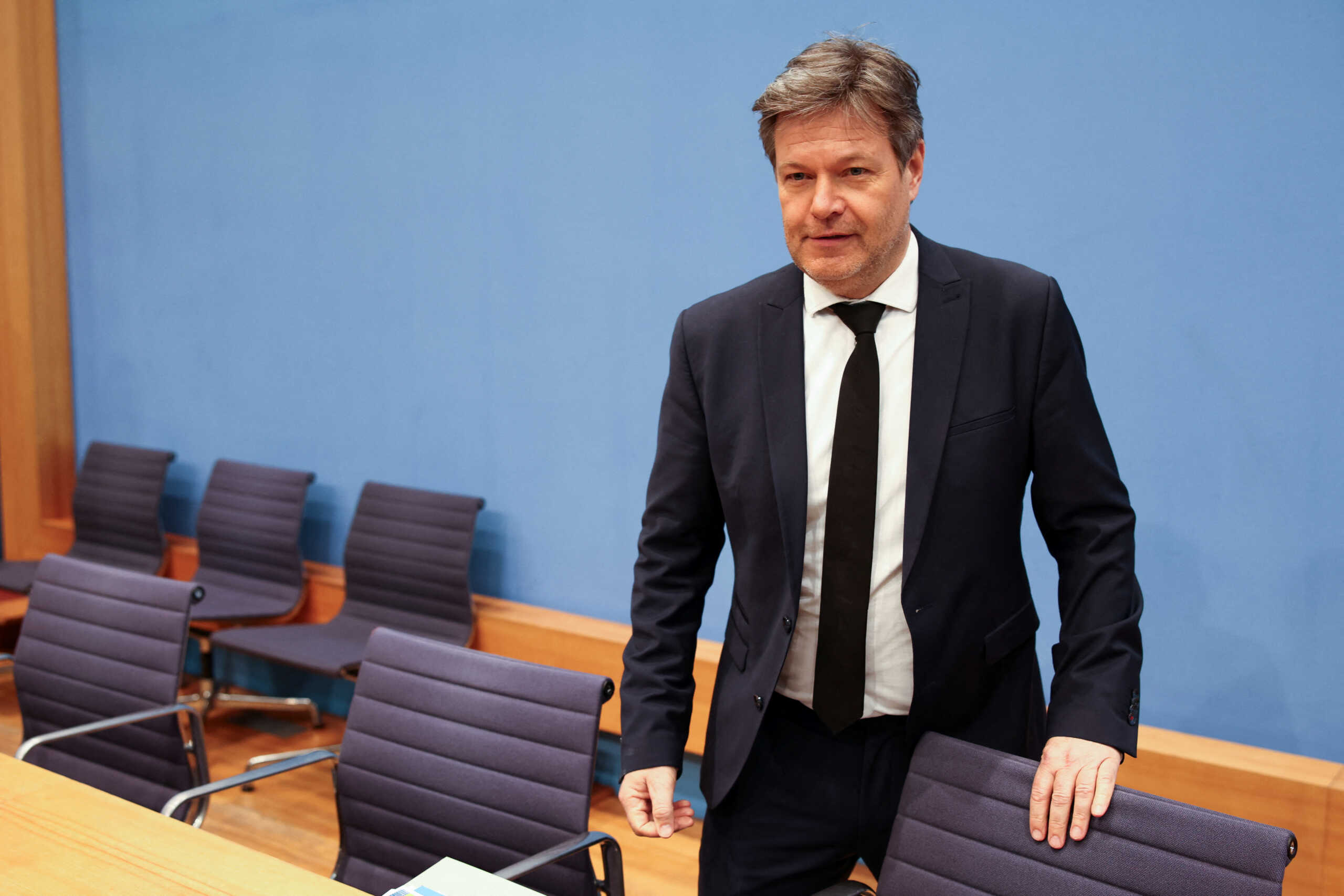 German Economy and Climate Minister Robert Habeck stands to present the Annual Economic Report 2024 in Berlin, Germany, February 21, 2024. REUTERS