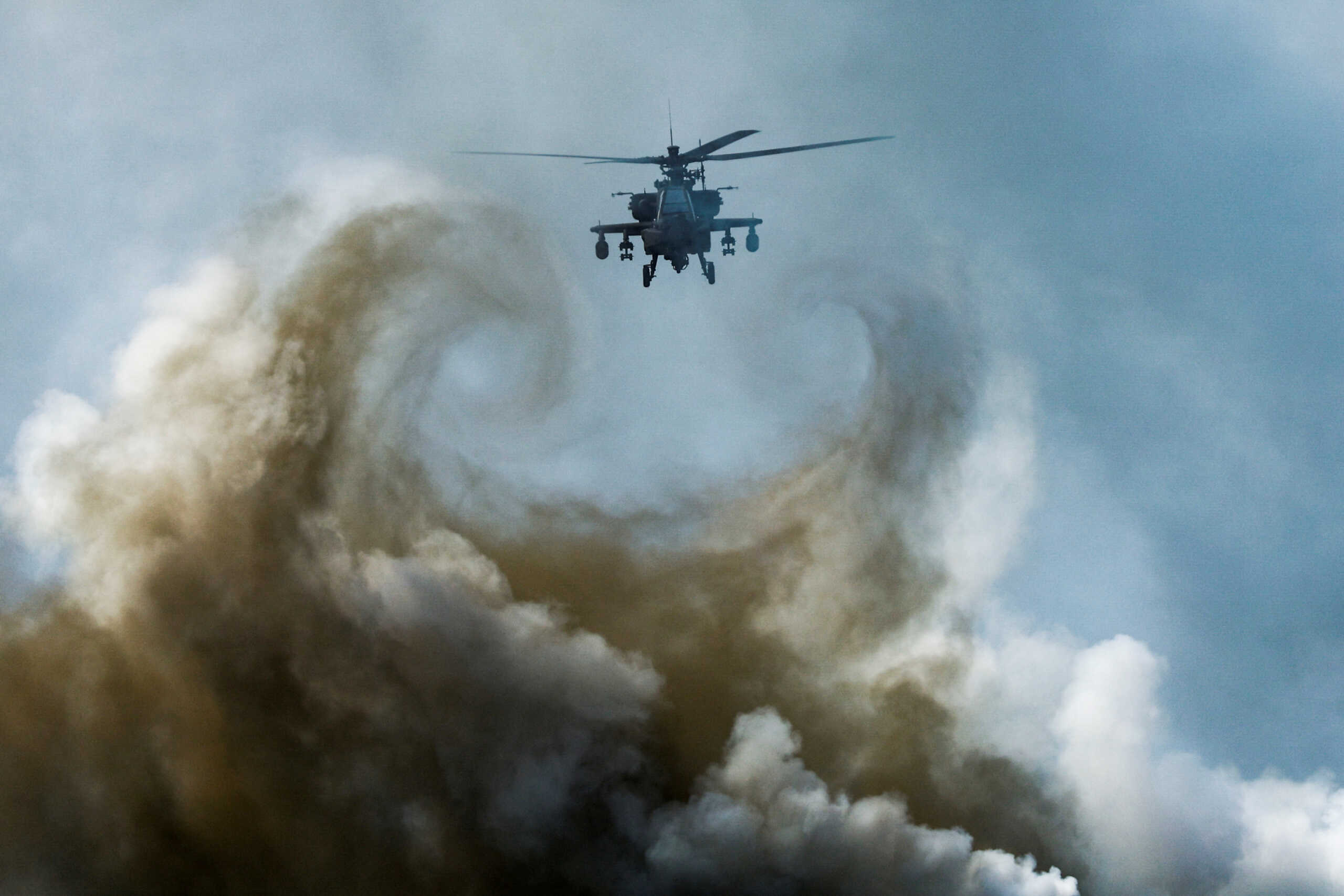 A military helicopter flies during an amphibious assault exercise as part of the "Cobra Gold 2024" (CG24) joint military exercise at a military base in Chonburi province, Thailand, March 1, 2024. REUTERS