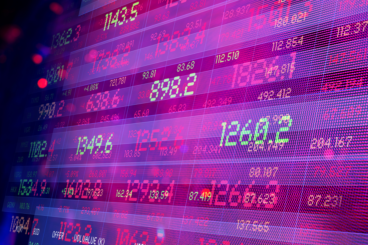 Financial Data. Abstracted finance screens. Bright lights and reflections in background.