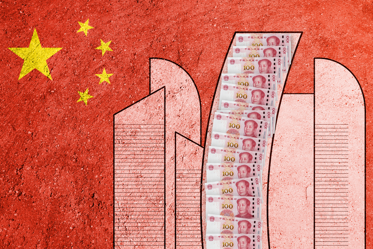Flag of China painted on a concrete wall. Chinese real estate and debt crisis. Economic crisis