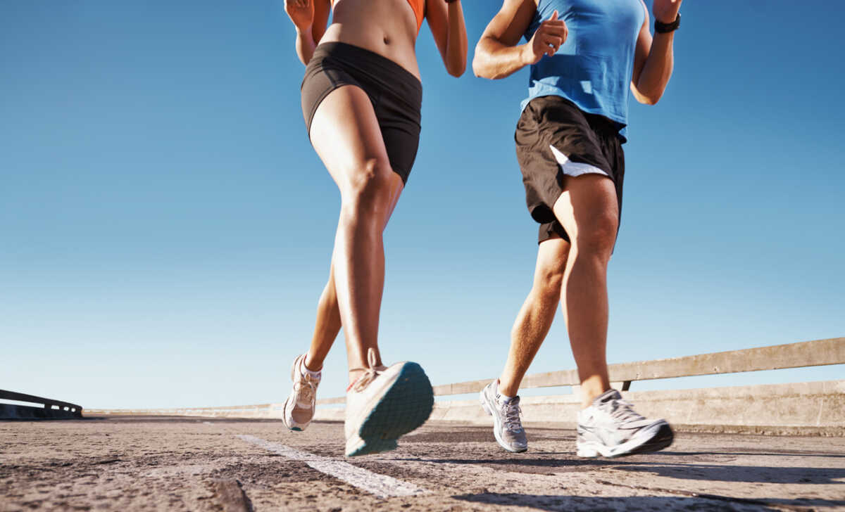 Cropped image of a couple going for a jog