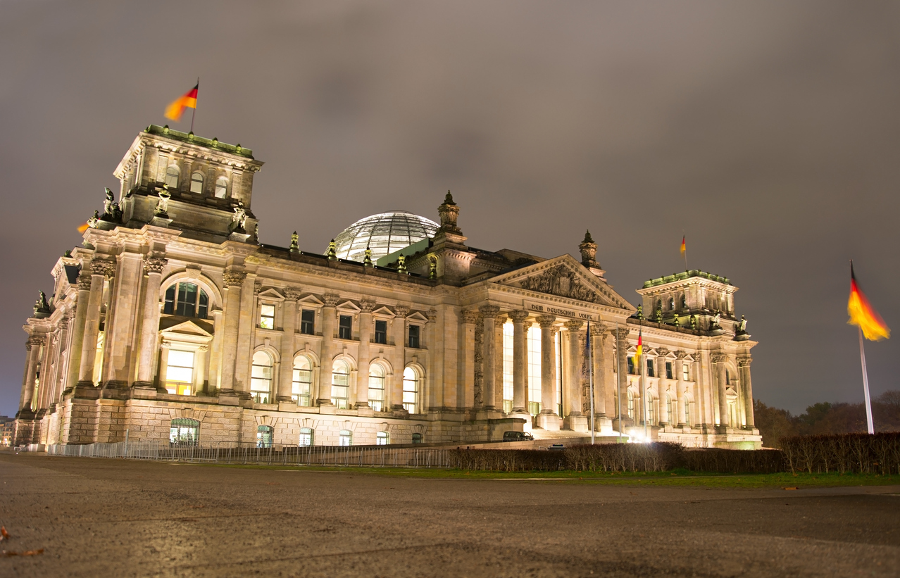 Side view of Reichstag building at night in Berlin, Germany