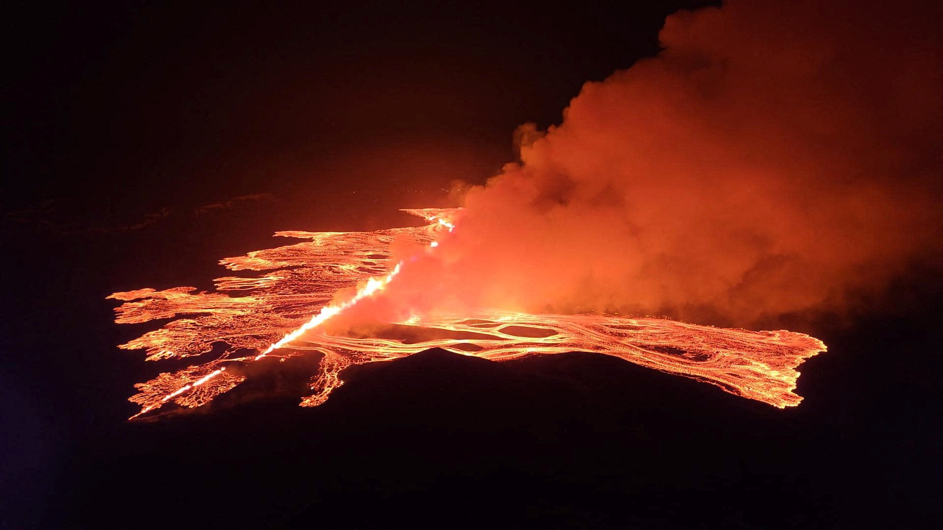 A volcanic eruption takes place, near Grindavik, Iceland, March 16, 2024, in this handout picture obtained by Reuters.   Public Security Department of Icelandic Police