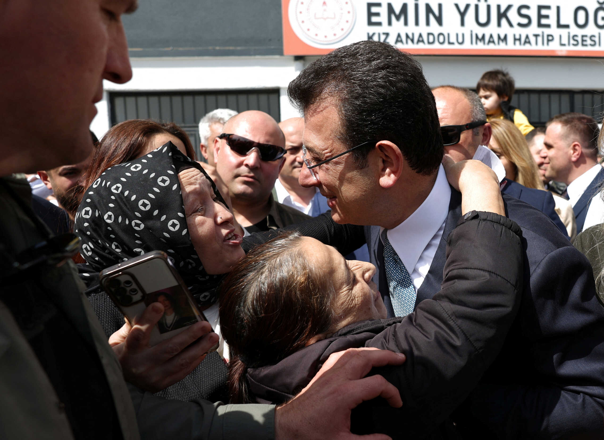 Istanbul Mayor Ekrem Imamoglu, mayoral candidate of the main opposition Republican People's Party (CHP), is greeted by his supporters after casting his vote during the local elections in Istanbul, Turkey March 31, 2024. REUTERS