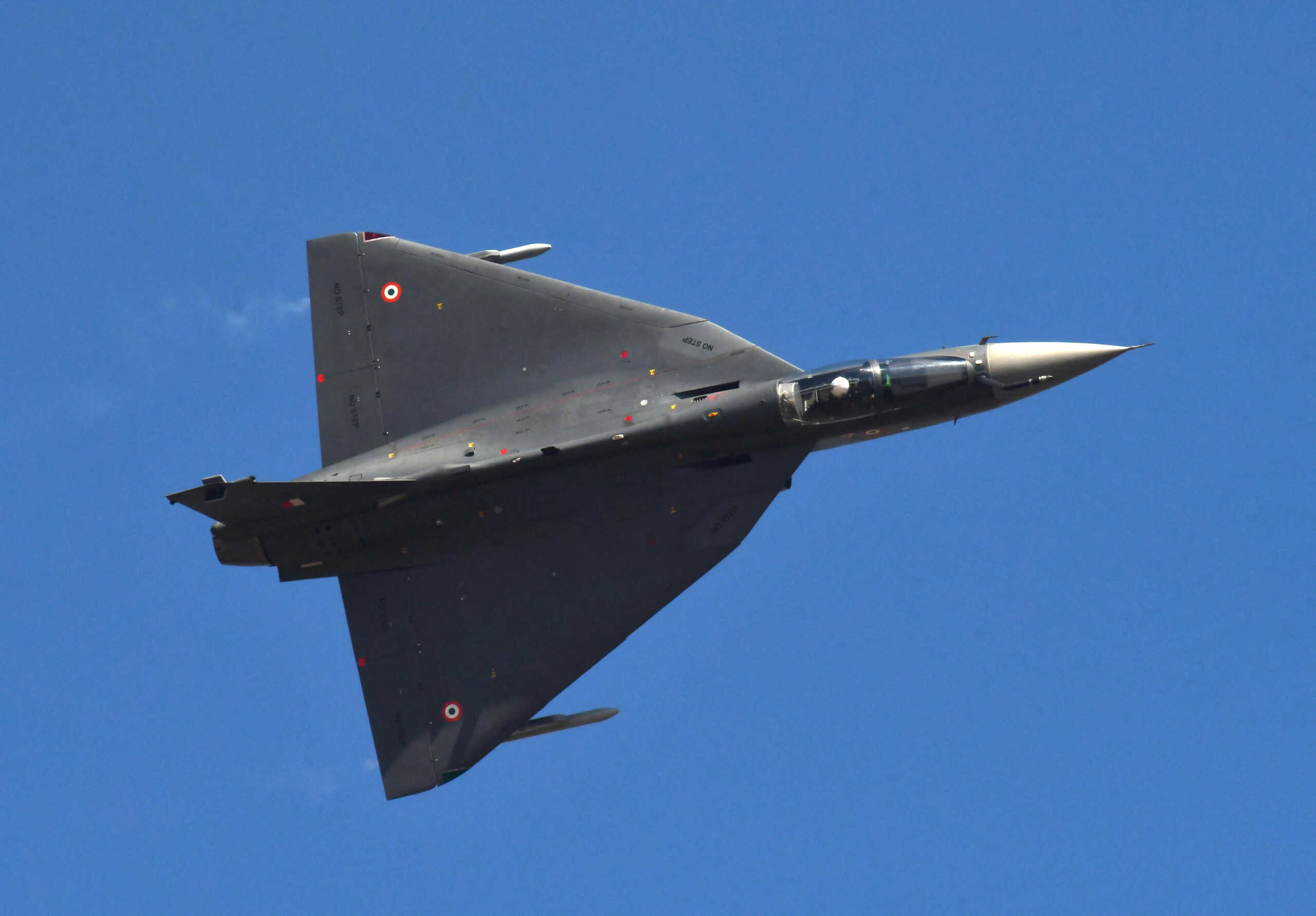 FILE PHOTO: Indian Air Force (IAF) LCA Tejas performs an aerobatic display during the Aero India 2023 air show at Yelahanka air base in Bengaluru, India, February 13, 2023. REUTERS