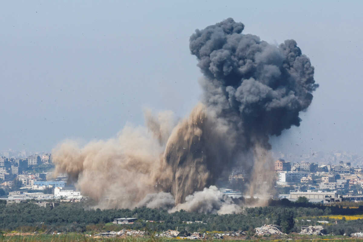 Smoke rises from an explosion in Gaza, amid the ongoing conflict between Israel and the Palestinian Islamist group Hamas, as seen from Israel, March 13, 2024. REUTERS