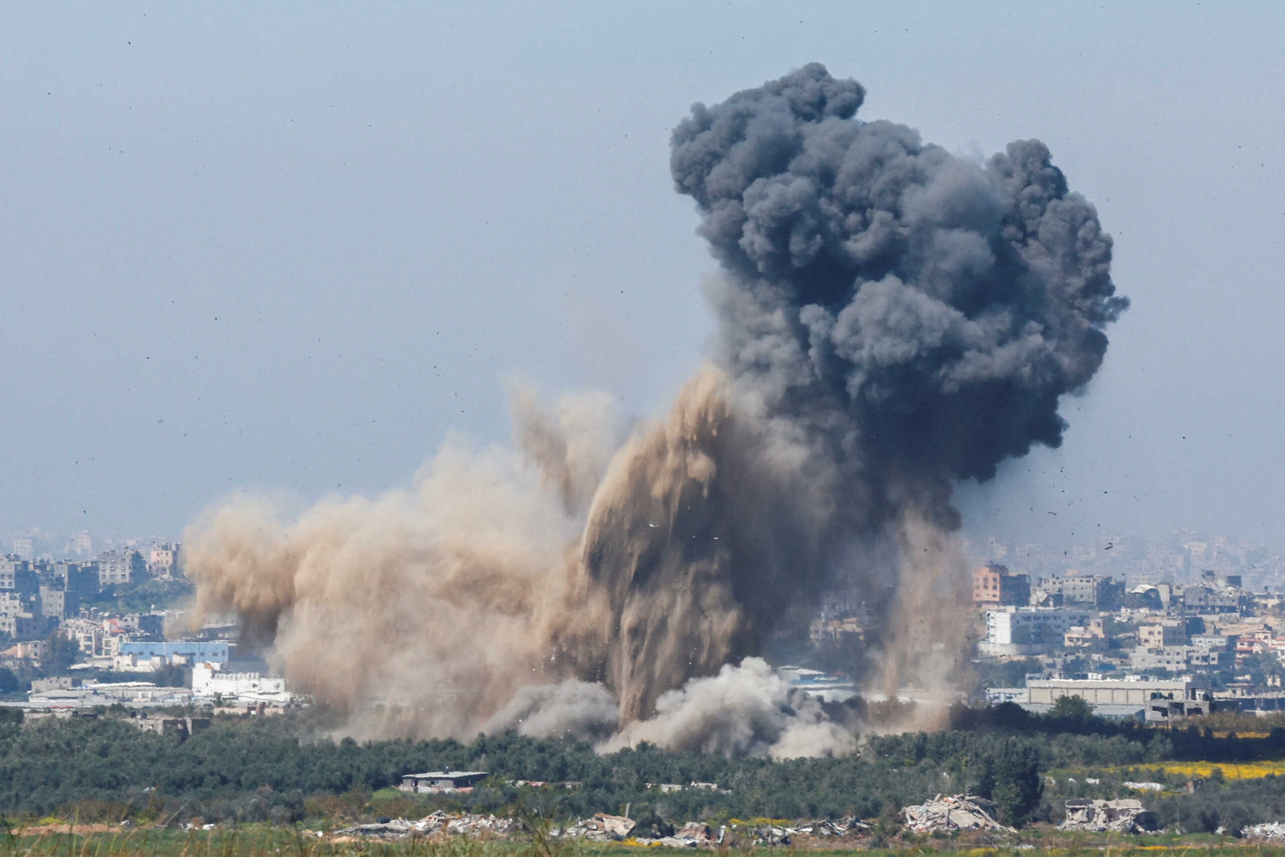 Smoke rises from an explosion in Gaza, amid the ongoing conflict between Israel and the Palestinian Islamist group Hamas, as seen from Israel, March 13, 2024. REUTERS