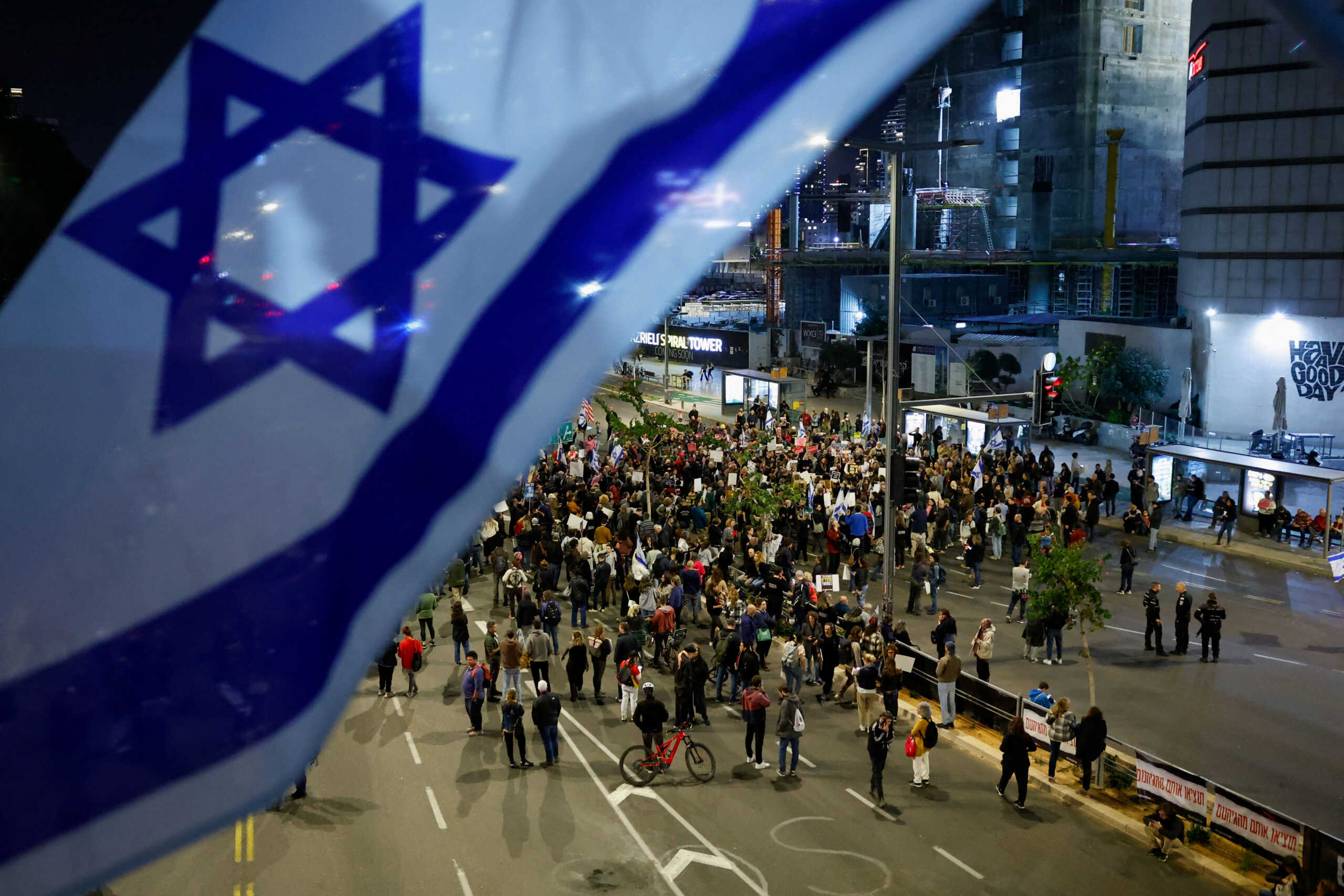 People block a road during a demonstration calling for the return of hostages held in Gaza since October 7, blaming Israeli Prime Minister Benjamin Netanyahu for the break down of the U.S. brokered hostage talks in Qatar, amid the ongoing conflict between Israel and Palestinian Islamist group Hamas, in Tel Aviv, Israel March 26, 2024. REUTERS