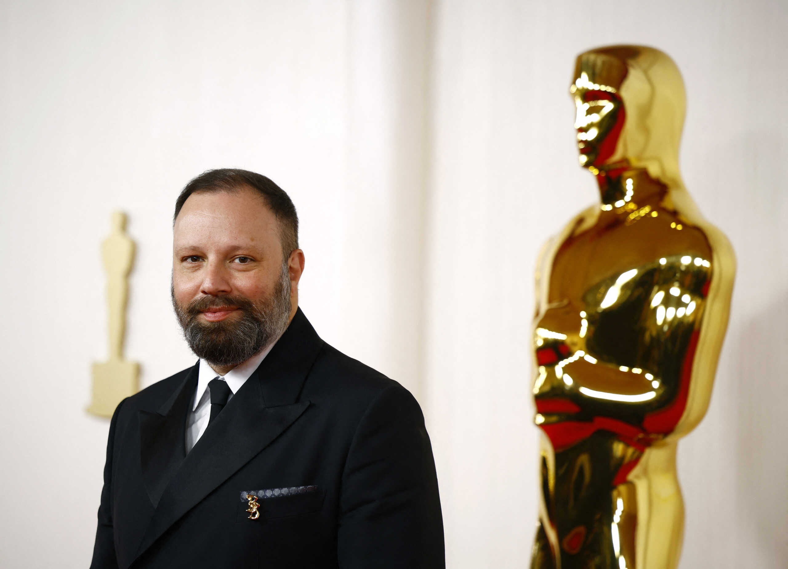 Yorgos Lanthimos poses on the red carpet during the Oscars arrivals at the 96th Academy Awards in Hollywood, Los Angeles, California, U.S., March 10, 2024. REUTERS