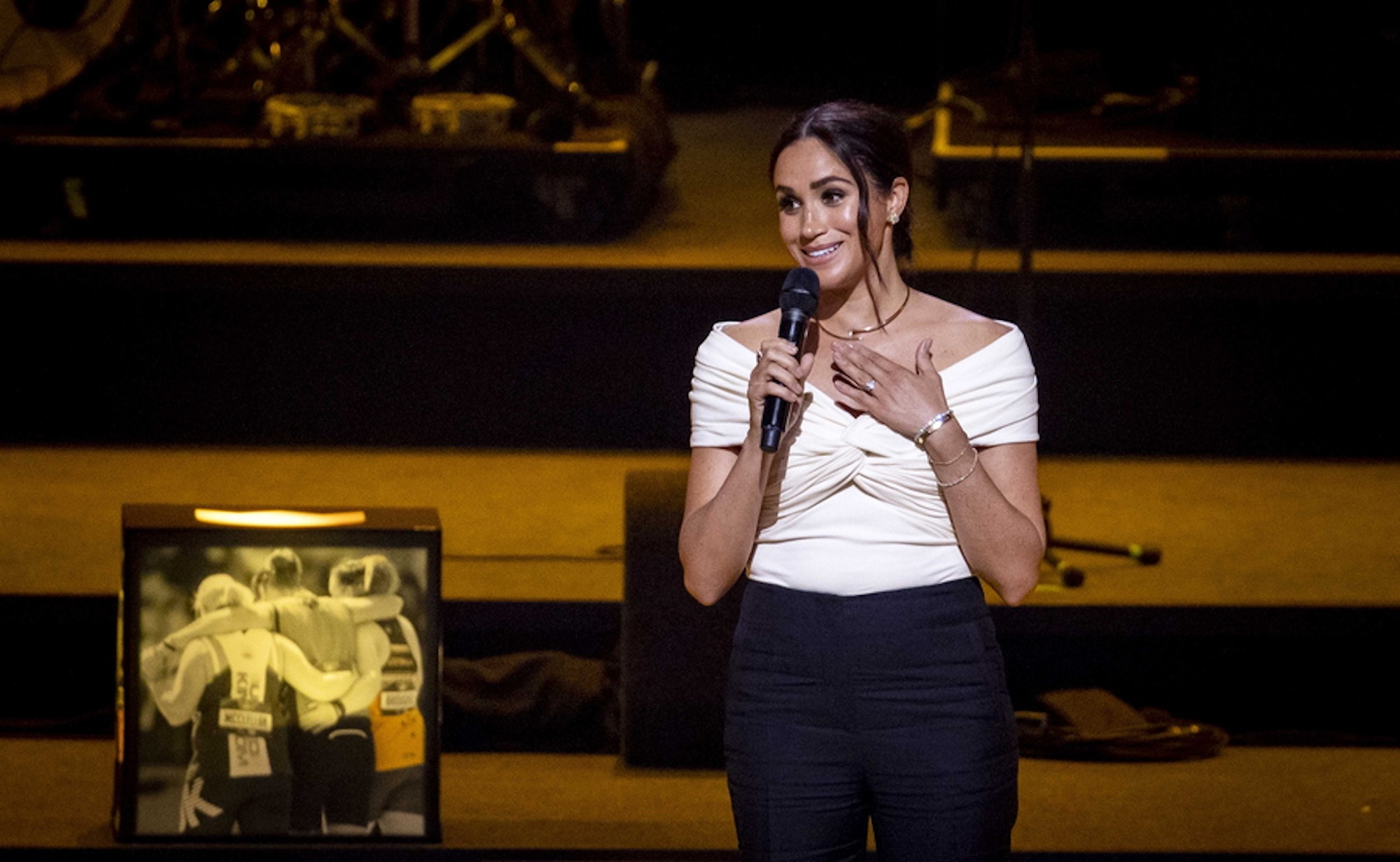 epa09893666 The Duchess of Sussex, Meghan Markle, speaks during the opening ceremony of the Invictus Games in The Hague, The Netherlands, 16 April 2022. The Invictus Games will take place from 16 to 22 April 2022 at the Zuiderpark and are intended for military personnel and veterans who have been psychologically or physically injured in service.  EPA