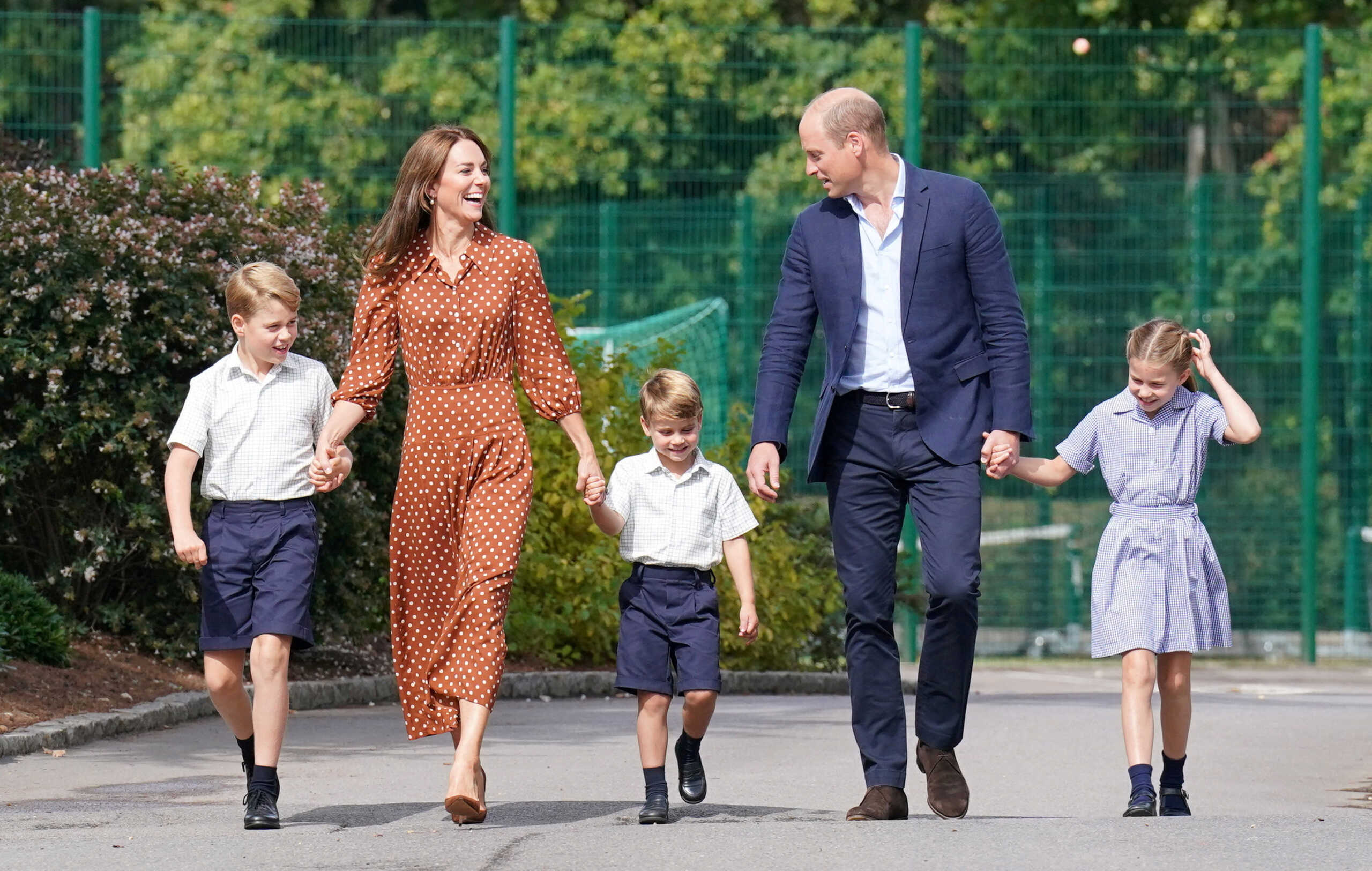 FILE PHOTO: Britain's Prince George, Princess Charlotte and Prince Louis, accompanied by their parents Prince William and Catherine, Duchess of Cambridge, arrive for a settling-in afternoon at Lambrook School, an annual event held to welcome new starters and their families the day before the start of the new school term, near Ascot in Berkshire, Britain, September 7, 2022. Jonathan Brady