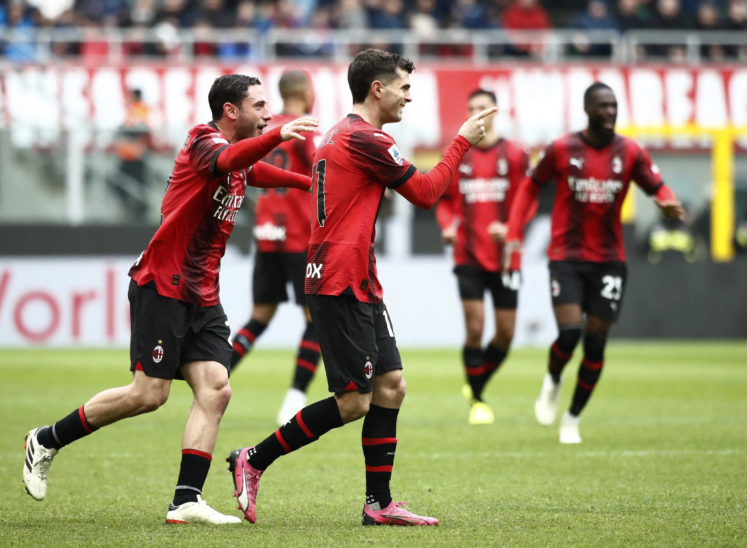 Soccer Football - Serie A - AC Milan v Empoli - San Siro, Milan, Italy - March 10, 2024 AC Milan's Christian Pulisic celebrates scoring their first goal with teammates REUTERS