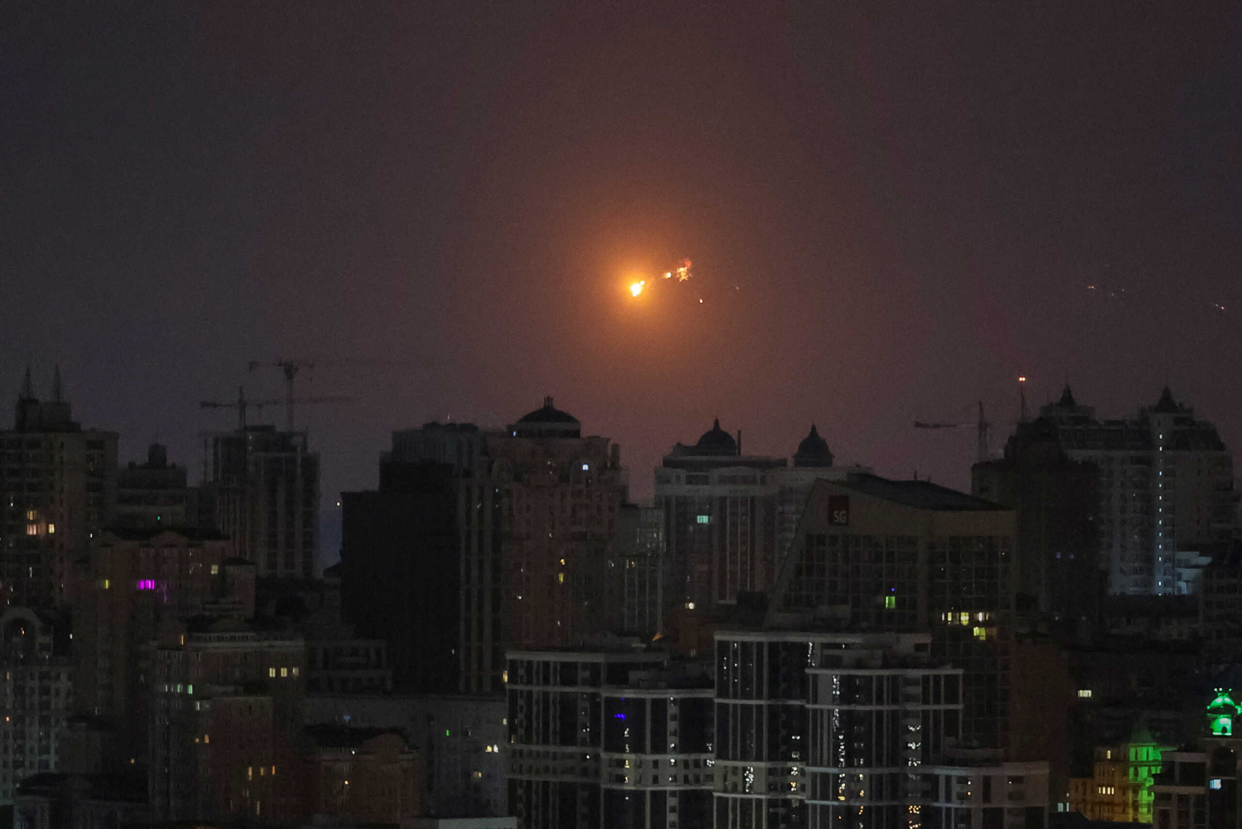 An explosion of a missile is seen in the sky over the city during a Russian missile strike, amid Russia's attack on Ukraine, in Kyiv, Ukraine March 24, 2024. REUTERS
