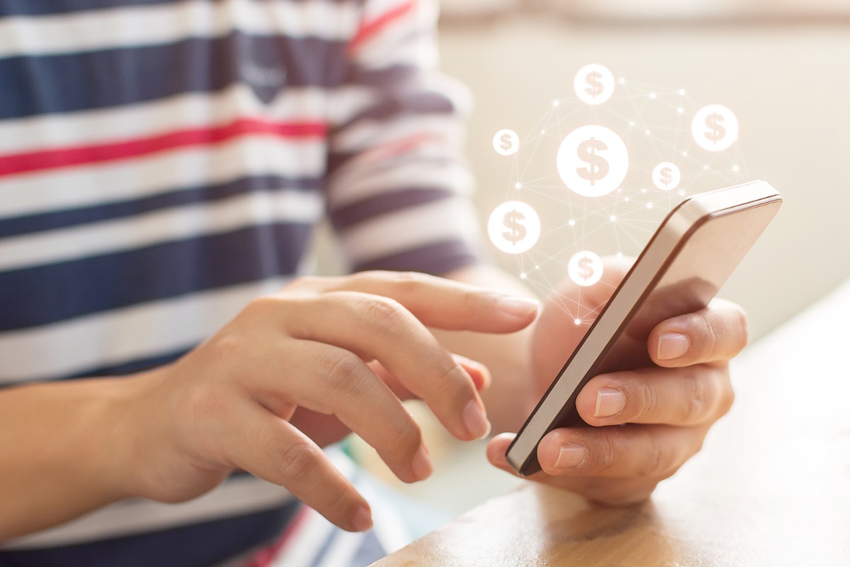 Close up image hand using mobile phone with online transaction application, Concept financial technology (fintech)