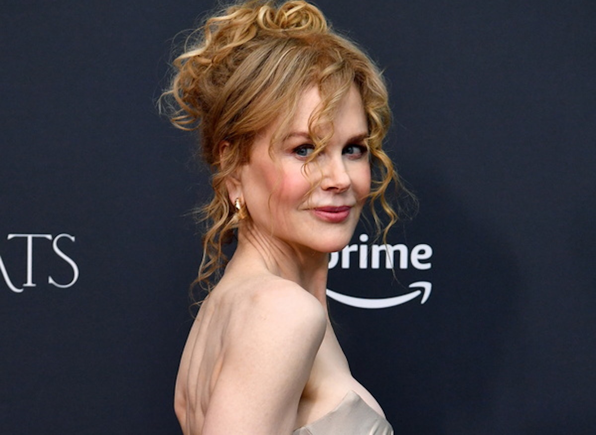 epa11038115 Nicole Kidman poses for photographs as she arrives on the red carpet for a screening of the Prime Video series 'Expats' at Palace Verona Cinema in Sydney, Australia, 20 December 2023.  EPA
