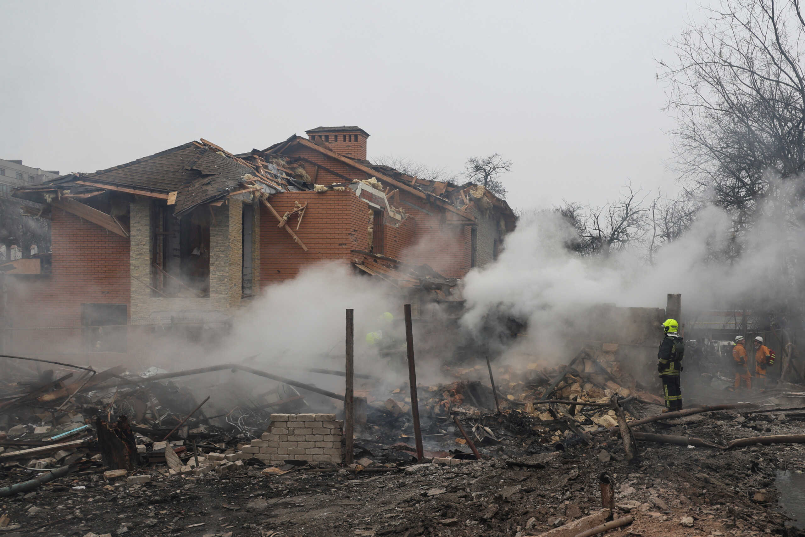 A rescuer stands in a residential area hit by a Russian missile strike, amid Russia's attack on Ukraine, in Odesa, Ukraine March 15, 2024. REUTERS