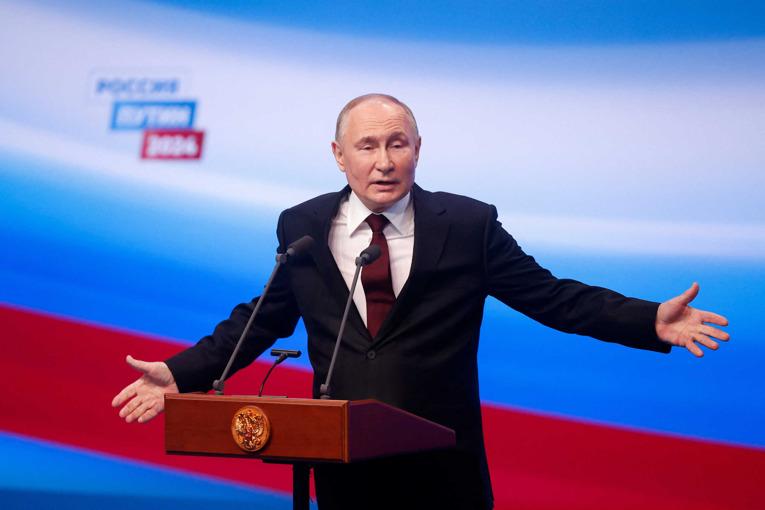 Russian presidential candidate and incumbent President Vladimir Putin speaks after polling stations closed, in Moscow, Russia, March 18, 2024. REUTERS