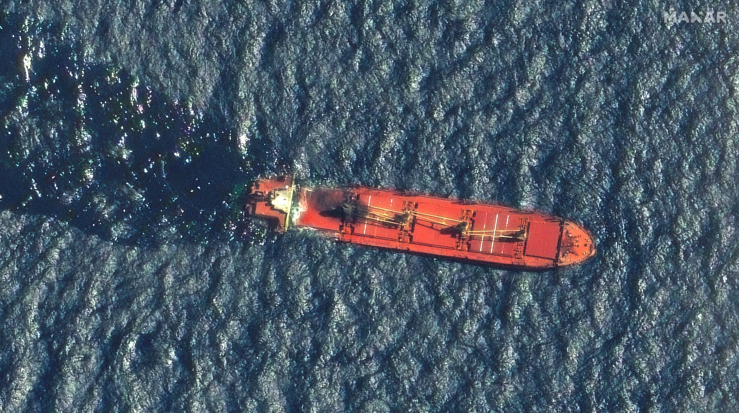 A satellite image shows the Belize-flagged and UK-owned cargo ship Rubymar, which was attacked by Yemen's Houthis, according to the U.S. military's Central Command, before it sank, on the Red Sea, March 1, 2024.  Maxar Technologies