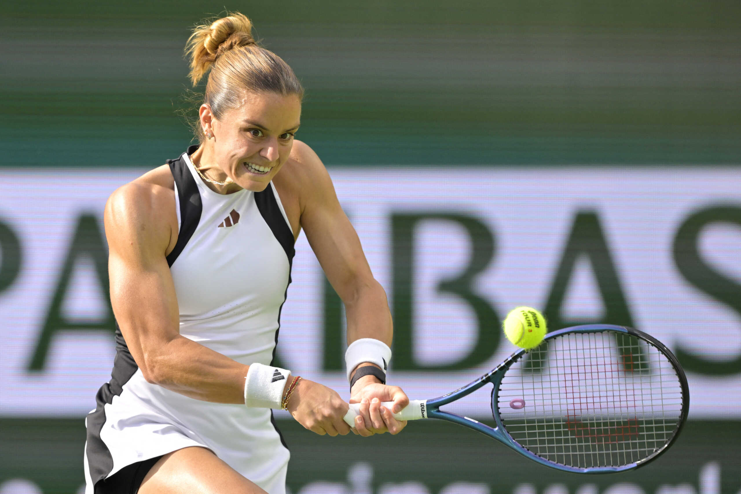 Mar 13, 2024; Indian Wells, CA, USA;  Maria Sakkari (GRE) hits a shot in her fourth round match against Diane Parry (FRA) in the BNP Paribas Open at the Indian Wells Tennis Garden. Mandatory Credit: Jayne Kamin-Oncea-USA TODAY Sports