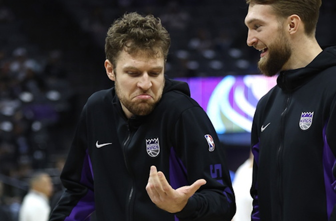 epa11030425 Sacramento Kings forwards Sasha Vezenkov (L) and Domantas Sabonis share a laugh before their NBA game against Oklahoma City Thunder in Sacramento, California, USA, 14 December 2023.  EPA