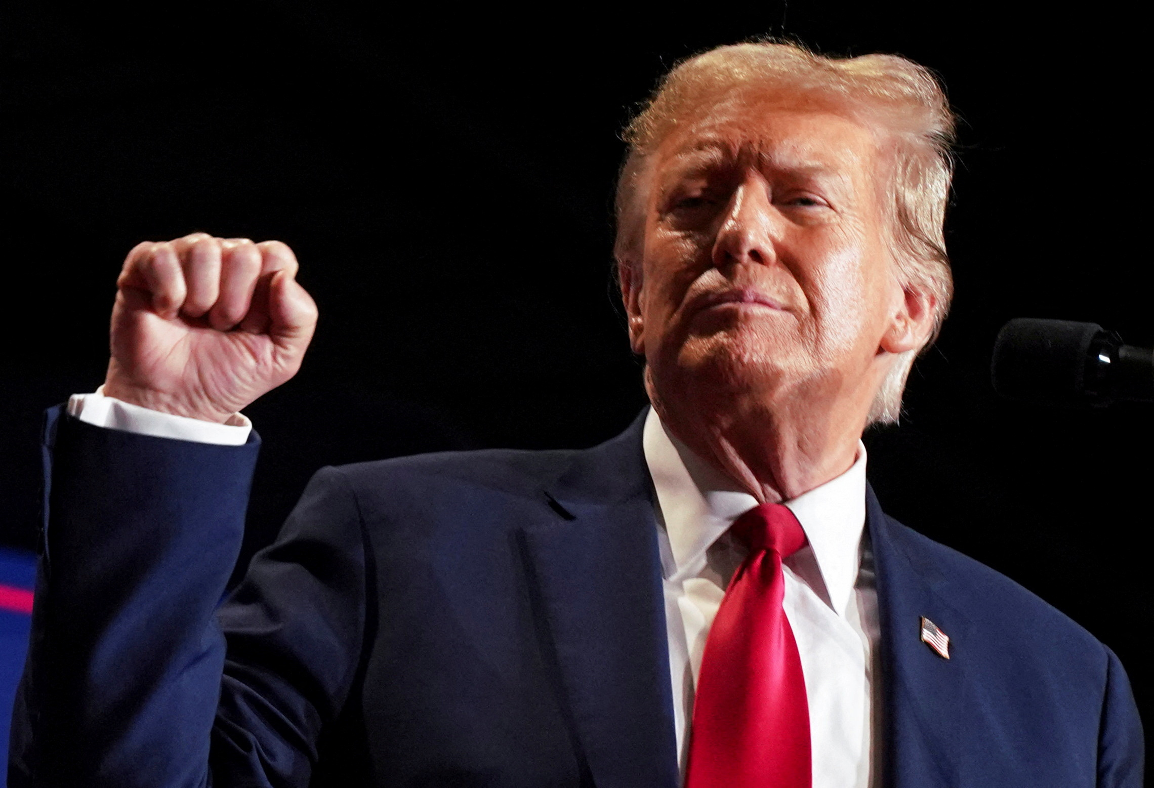 FILE PHOTO: Republican presidential candidate and former U.S. President Donald Trump reacts on stage during a campaign rally in Richmond, Virginia, U.S. March 2, 2024.  REUTERS