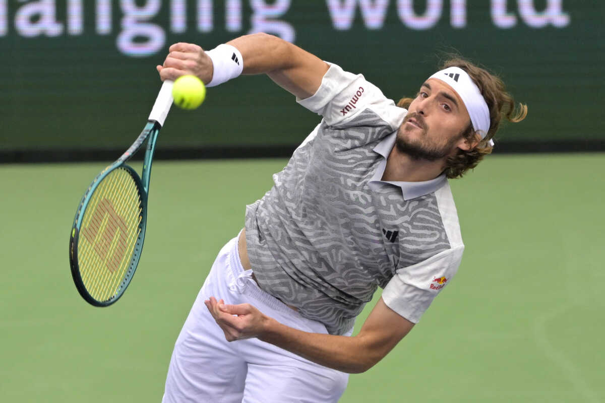 Mar 12, 2024; Indian Wells, CA, USA; Stefanos Tsitsipas (GRE) hits a shot in his fourth round match against Jiri Lehecka (CZE) in the BNP Paribas Open at the Indian Wells Tennis Garden. Mandatory Credit: Jayne Kamin-Oncea-USA TODAY Sports