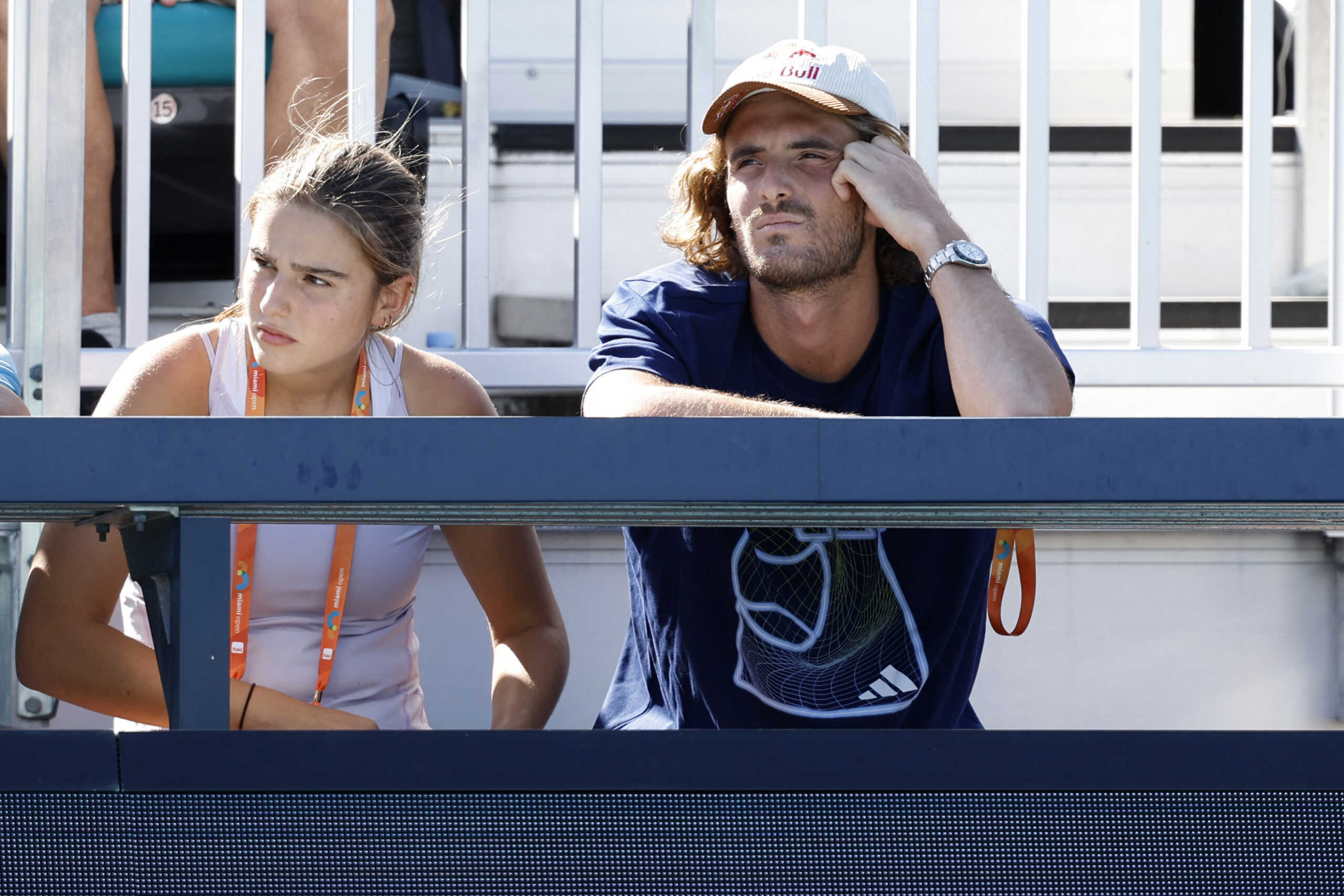 Mar 19, 2024; Miami Gardens, FL, USA; Stefanos Tsitsipas (R) looks on from the player's box of girlfriend Paula Badosa (ESP) (not pictured) during her match against Simona Halep (ROU) (not pictured) on day two of the Miami Open at Hard Rock Stadium. Mandatory Credit: Geoff Burke-USA TODAY Sports