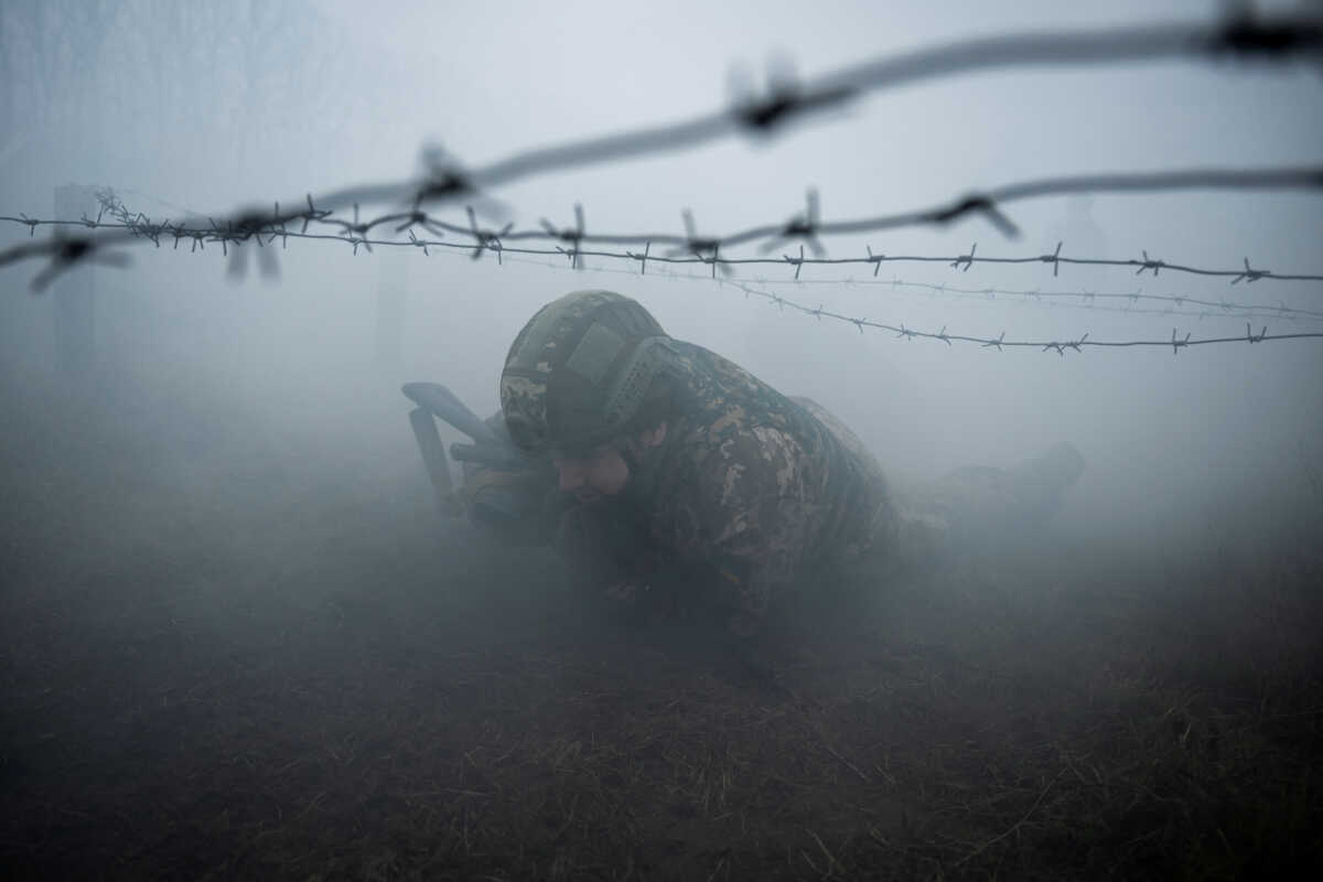 A new recruit of the 1st Da Vinci Wolves Separate Mechanized Battalion, named after Dmytro Kotsiubailo, attends a military exercise, amid Russia's attack on Ukraine, in an undisclosed location, in Central Ukraine March 12, 2024. REUTERS