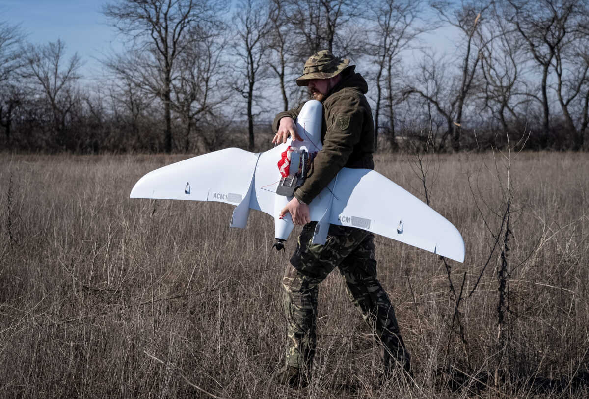 A Ukrainian serviceman of Kholodnyi Yar 93rd Separate Mechanized Brigade carries a Furiia reconnaissance drone after flying over positions of Russian troops, amid Russia's attack on Ukraine, near the frontline town of Bakhmut in Donetsk region, Ukraine February 29, 2024. REUTERS