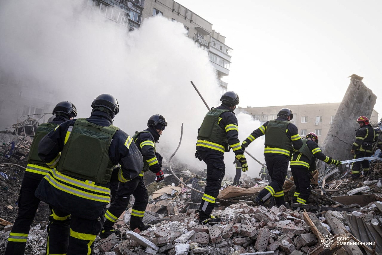 Rescuers work at a site of residential buildings heavily damaged by a Russian missile strike, amid Russia's attack on Ukraine, in Khmelnytskyi, Ukraine March 22, 2024. Press service of the State Emergency Service of Ukraine in Khmelnytskyi region