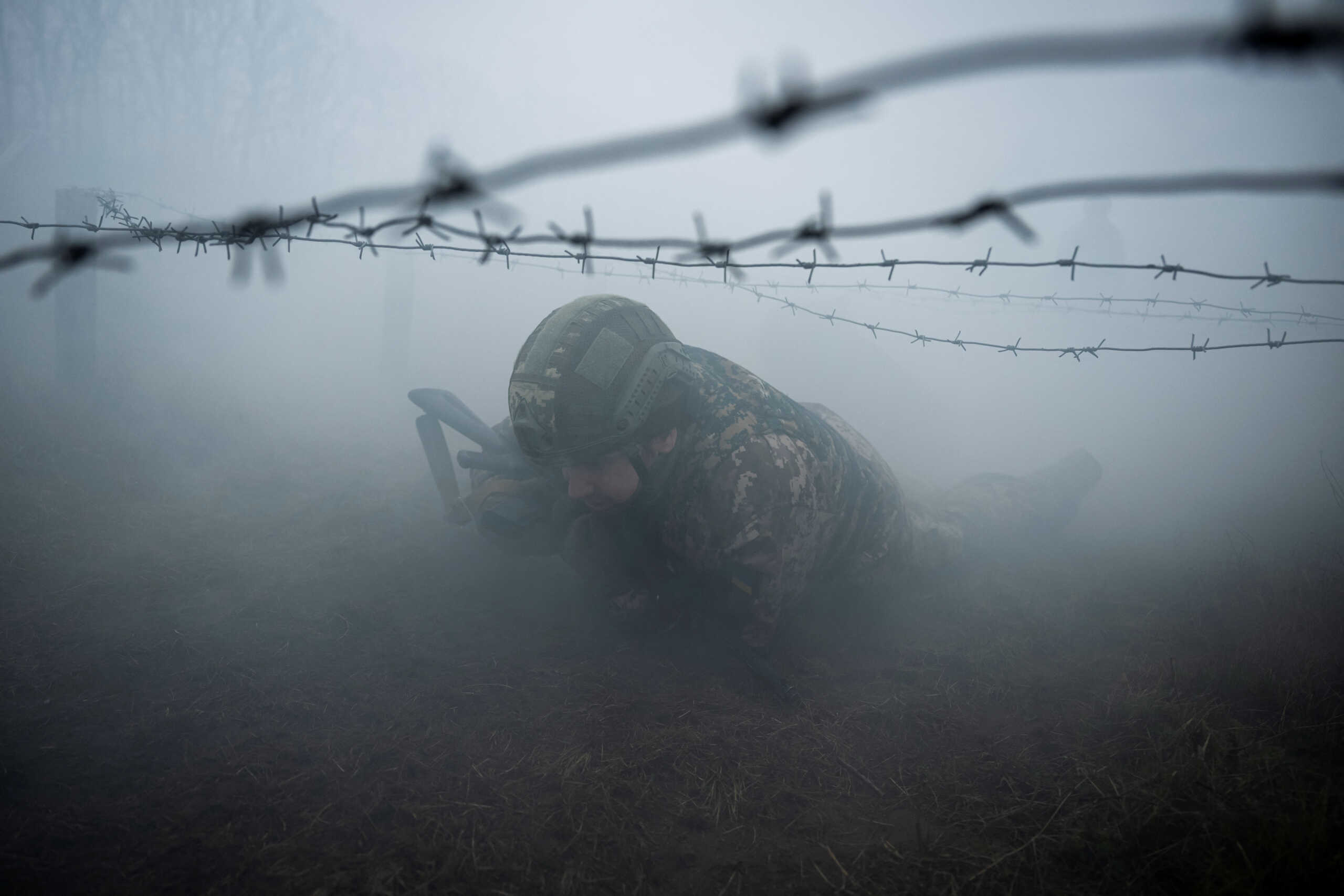 A new recruit of the 1st Da Vinci Wolves Separate Mechanized Battalion, named after Dmytro Kotsiubailo, attends a military exercise, amid Russia's attack on Ukraine, in an undisclosed location, in Central Ukraine March 12, 2024. REUTERS