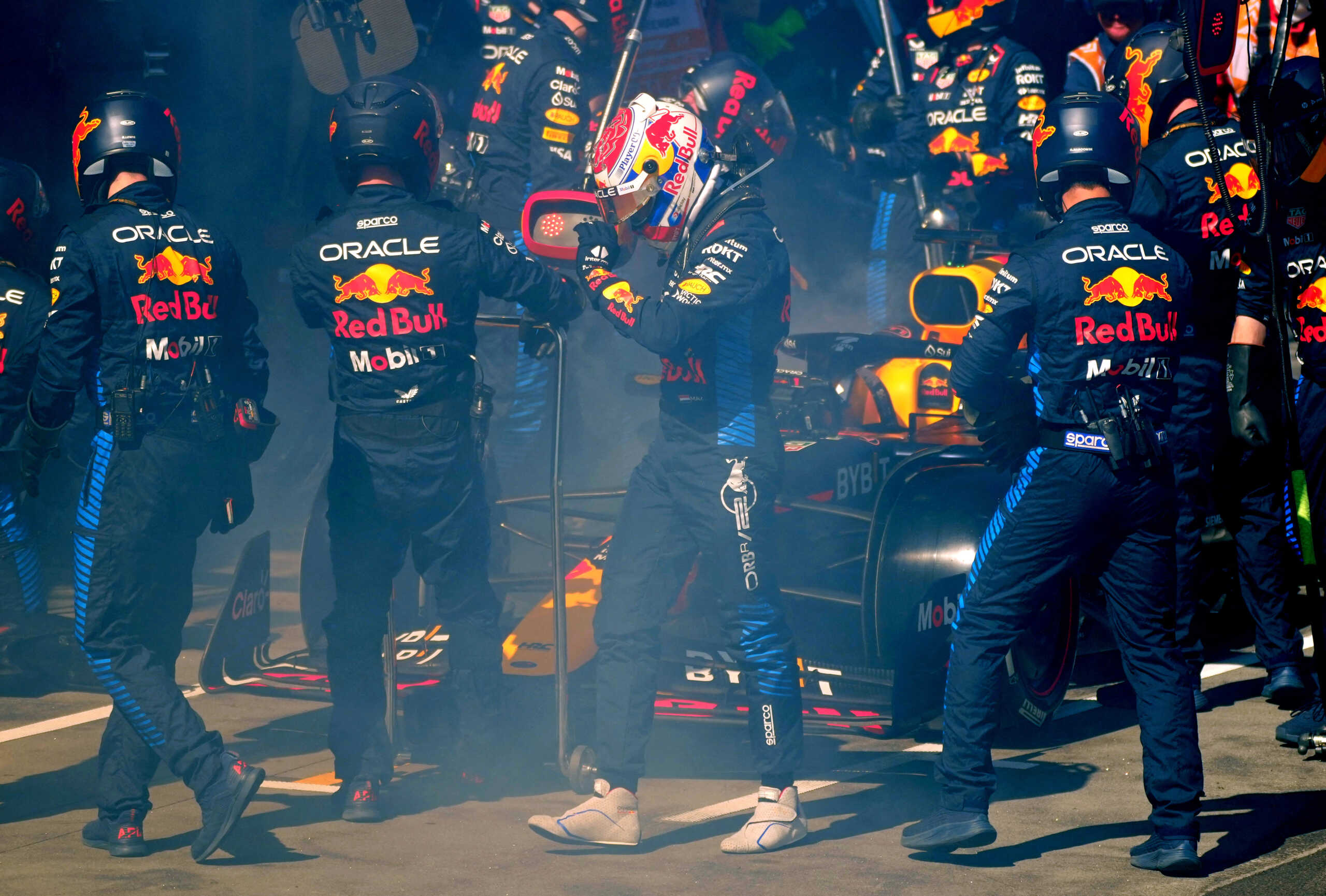 Formula One F1 - Australian Grand Prix - Melbourne Grand Prix Circuit, Melbourne, Australia - March 24, 2024 Red Bull's Max Verstappen returns to the pit stop after retiring from the race due to fire Pool via REUTERS