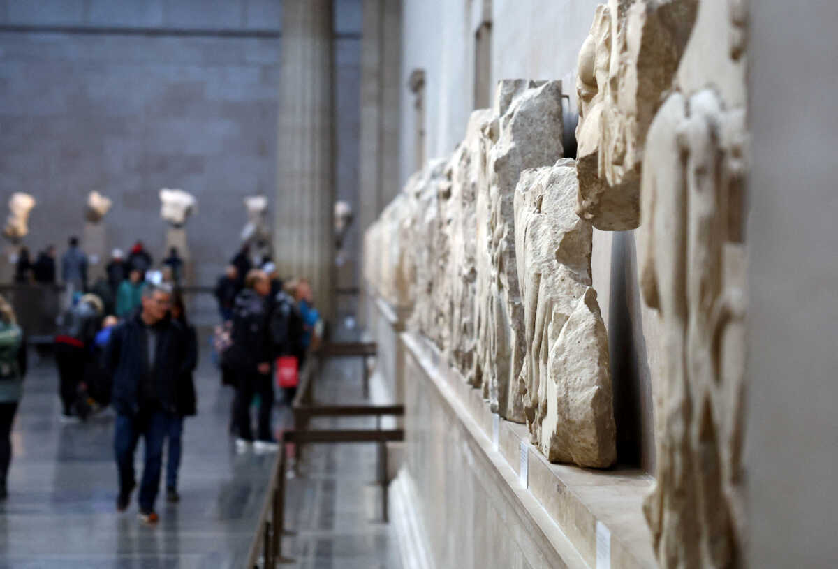 FILE PHOTO: People view examples of the Parthenon sculptures, sometimes referred to in the UK as the Elgin Marbles, on display at the British Museum in London, Britain, November 29, 2023. REUTERS