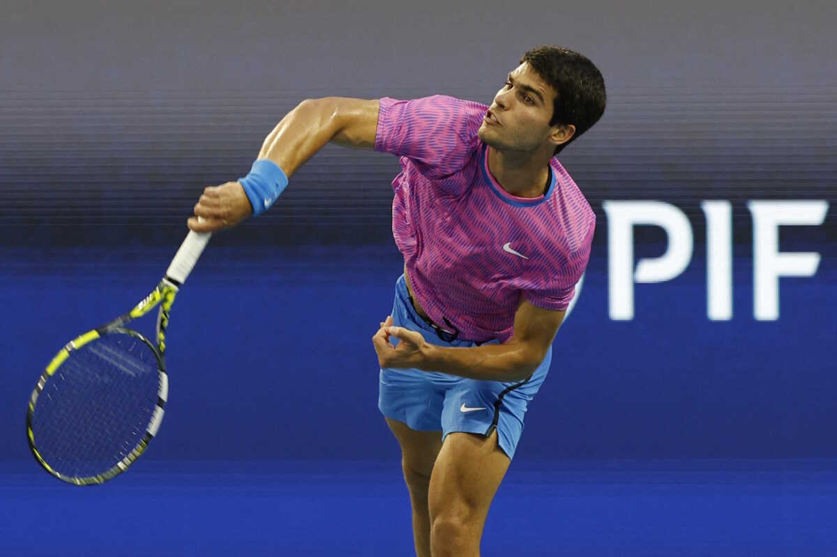 Mar 26, 2024; Miami Gardens, FL, USA; Carlos Alcaraz (ESP) hits a backhand against Lorenzo Musetti (ITA) (not pictured) on day nine of the Miami Open at Hard Rock Stadium. Mandatory Credit: Geoff Burke-USA TODAY Sports